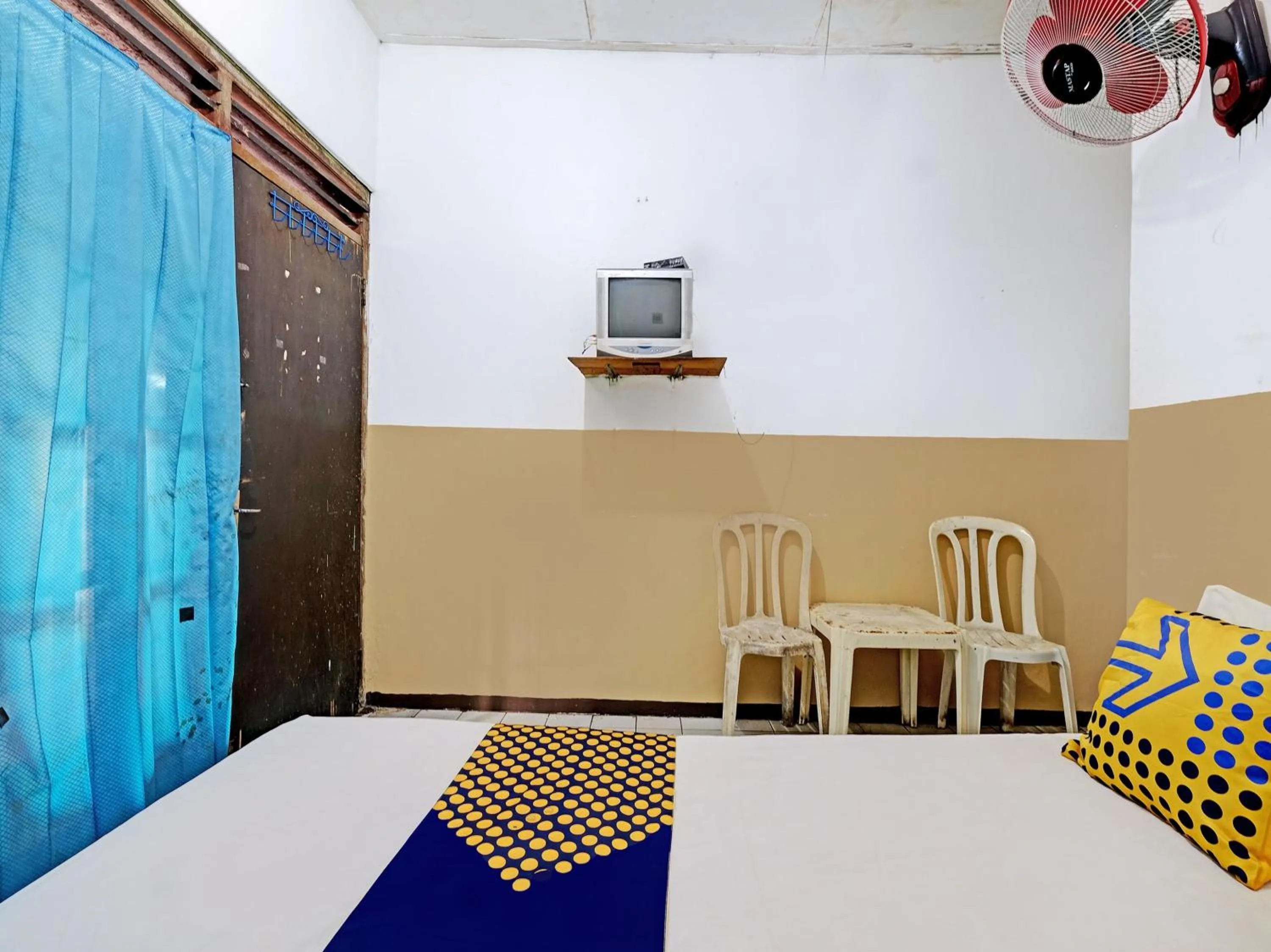 Bedroom in SPOT ON 92983 Hotel Ayu