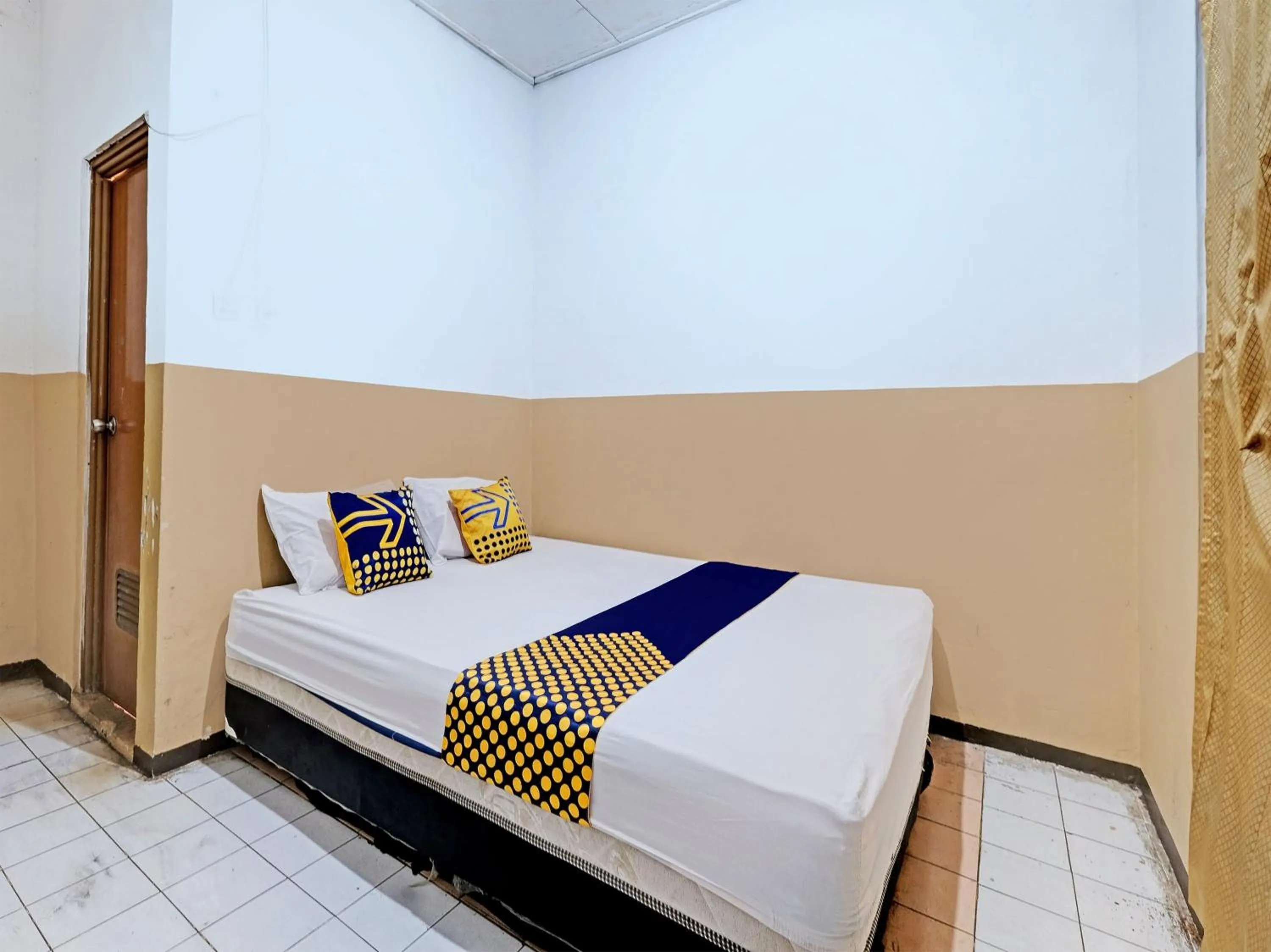 Bedroom in SPOT ON 92983 Hotel Ayu