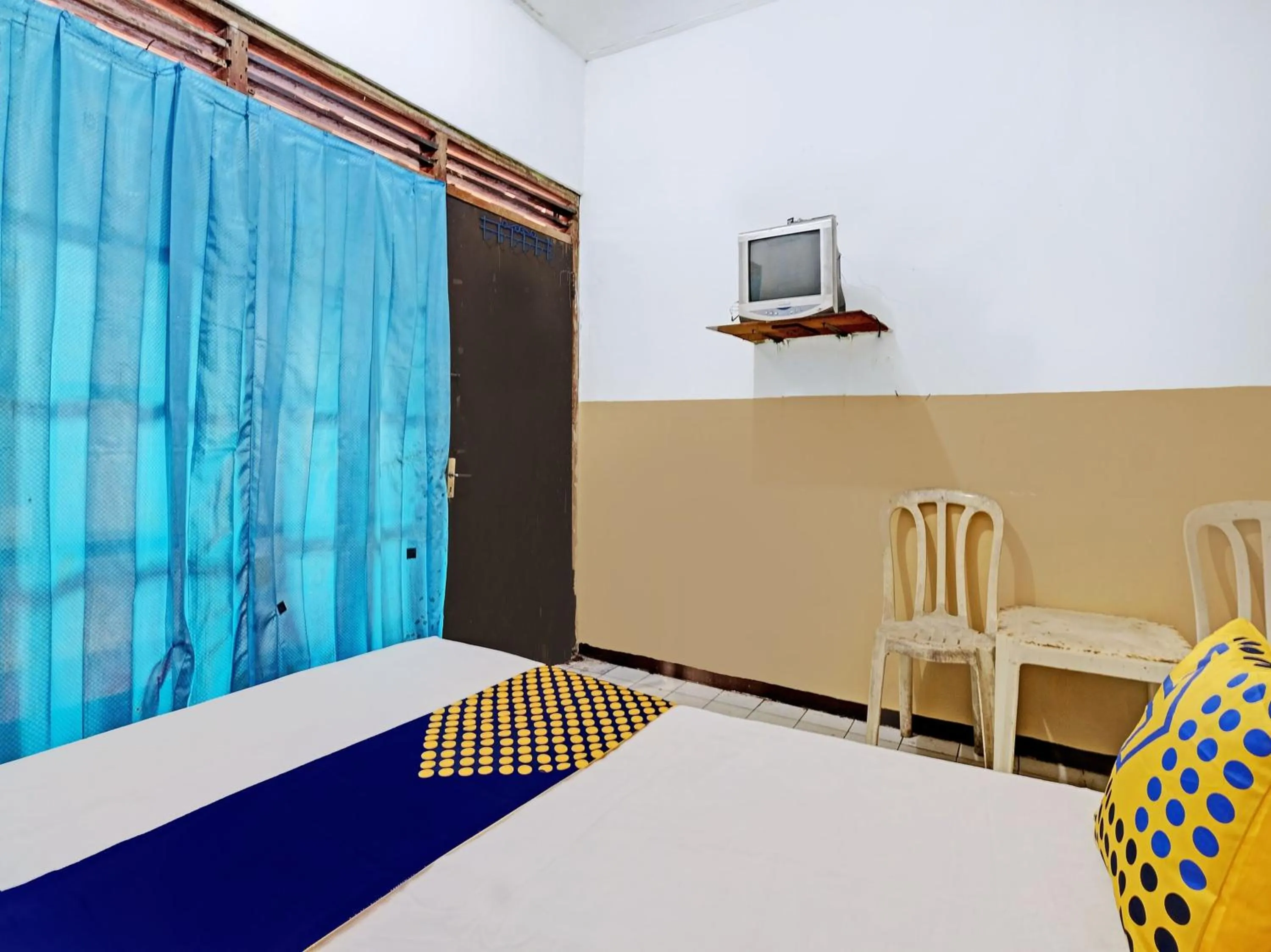 Bedroom in SPOT ON 92983 Hotel Ayu