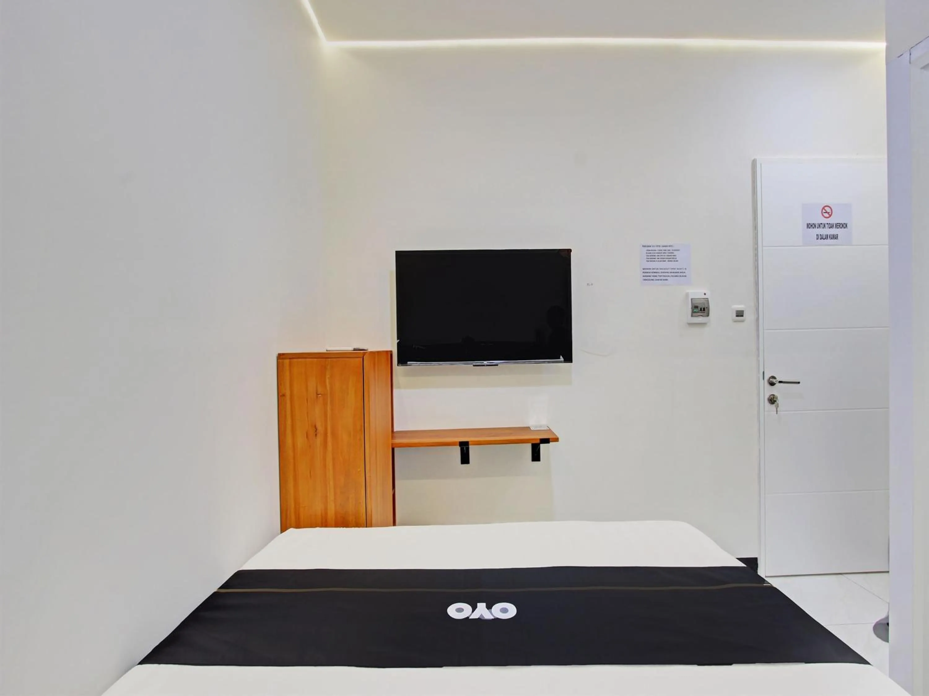 Bedroom in Collection O 92972 Gaharu Hotel