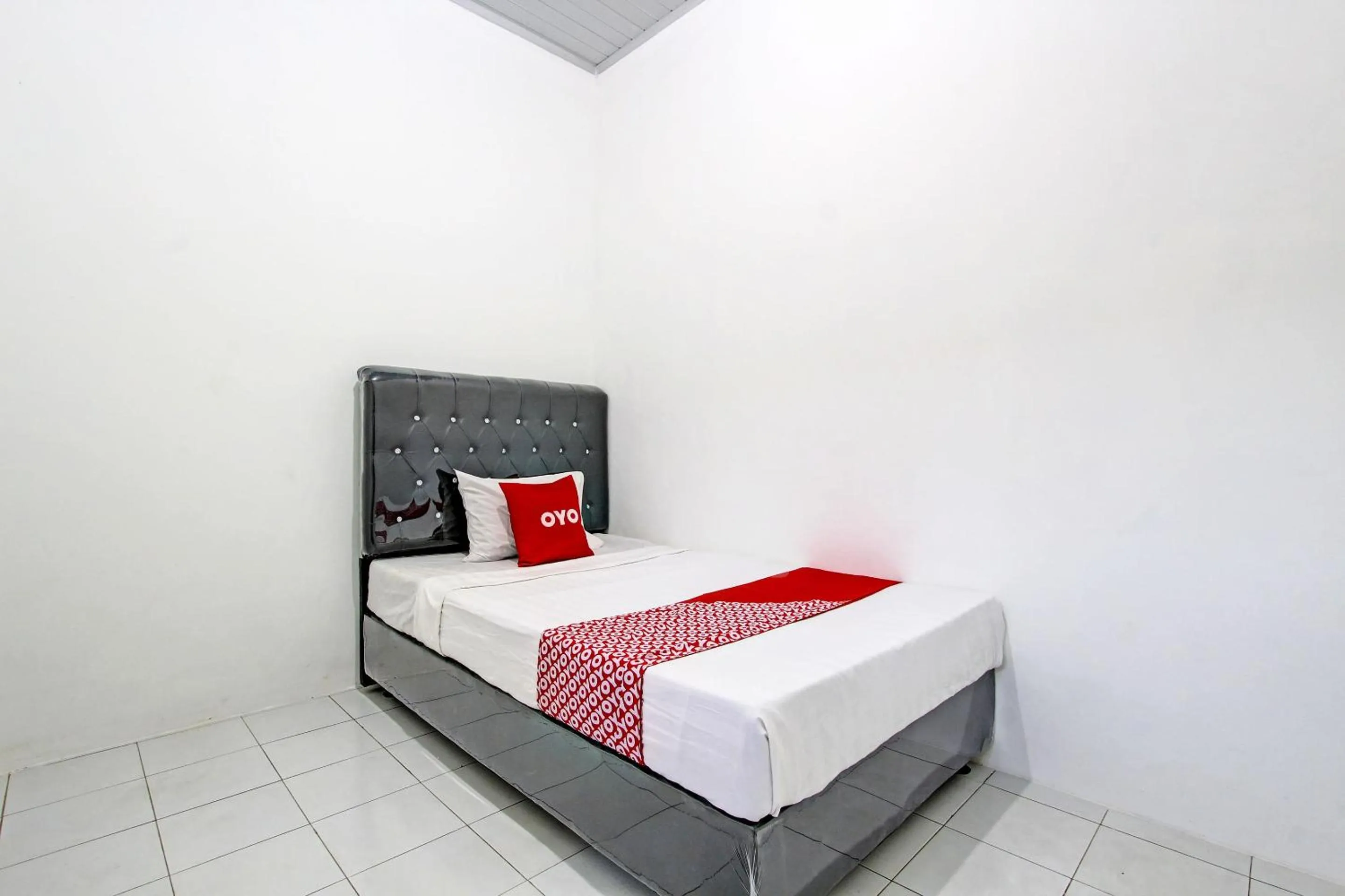 Bedroom, Bed in Hotel O Mi Casa Inn