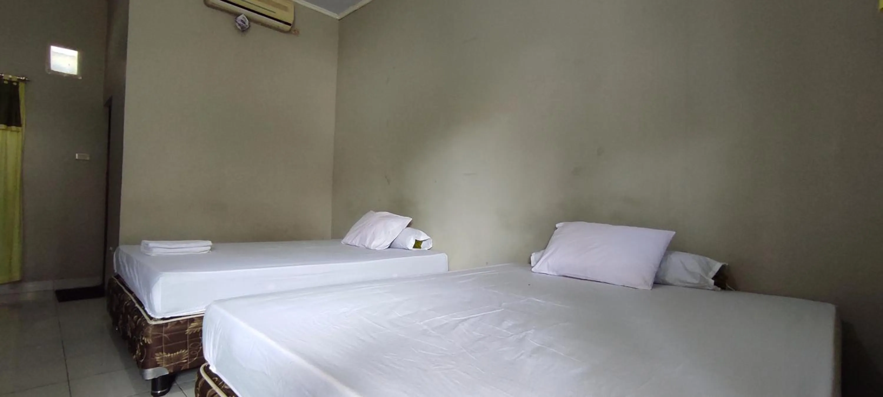 Bedroom in OYO 93051 Wisma Syariah Buloe Near Lapangan Abubakar Lambogo Batili Enrekang