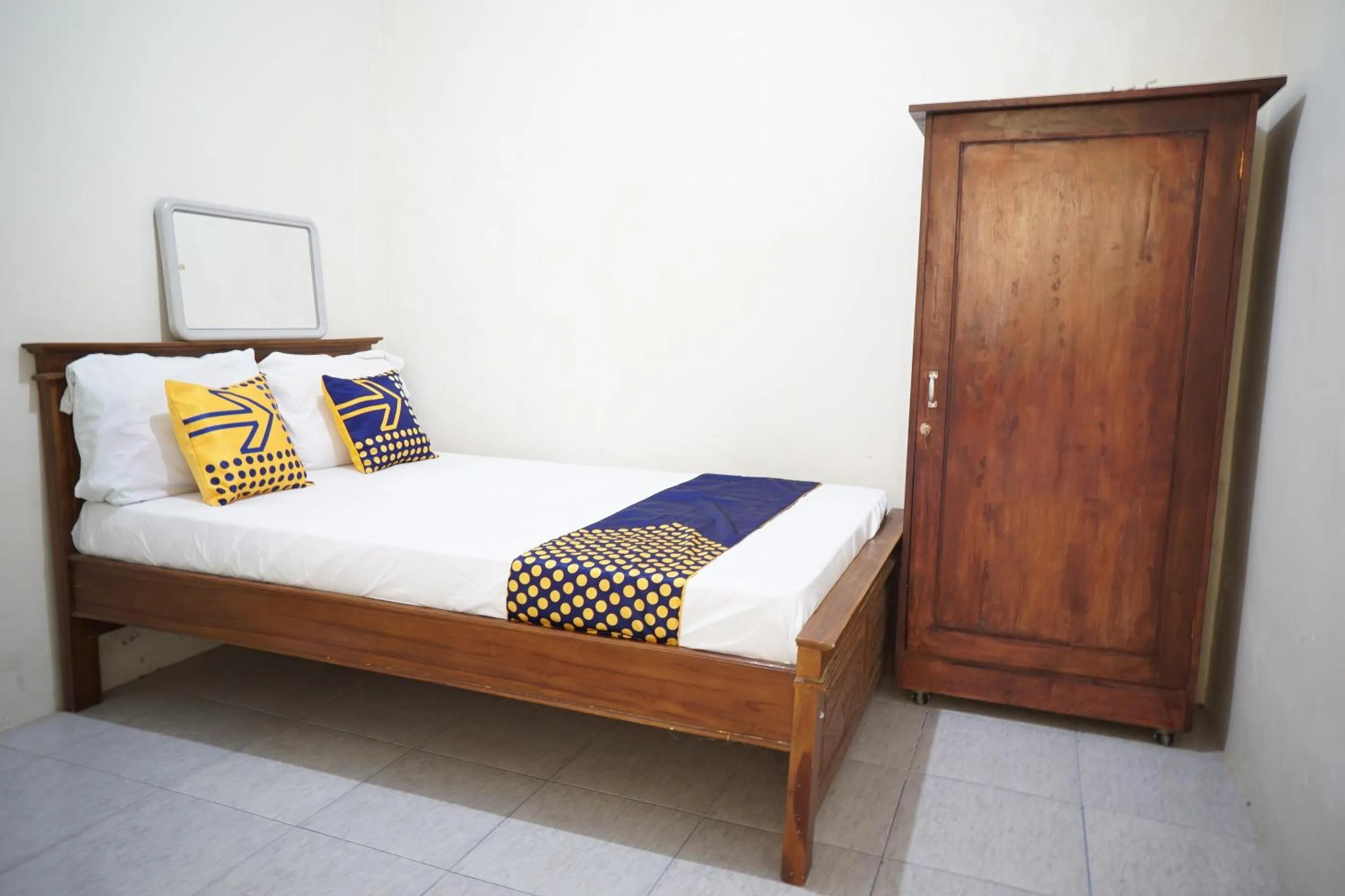 Bedroom in Hotel O Kost Amantu