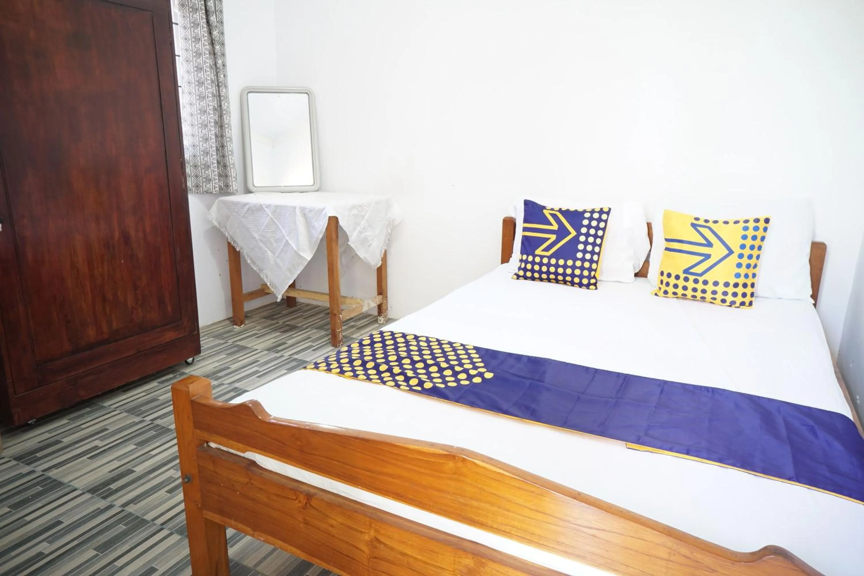 Photo of the whole room in Hotel O Kost Amantu