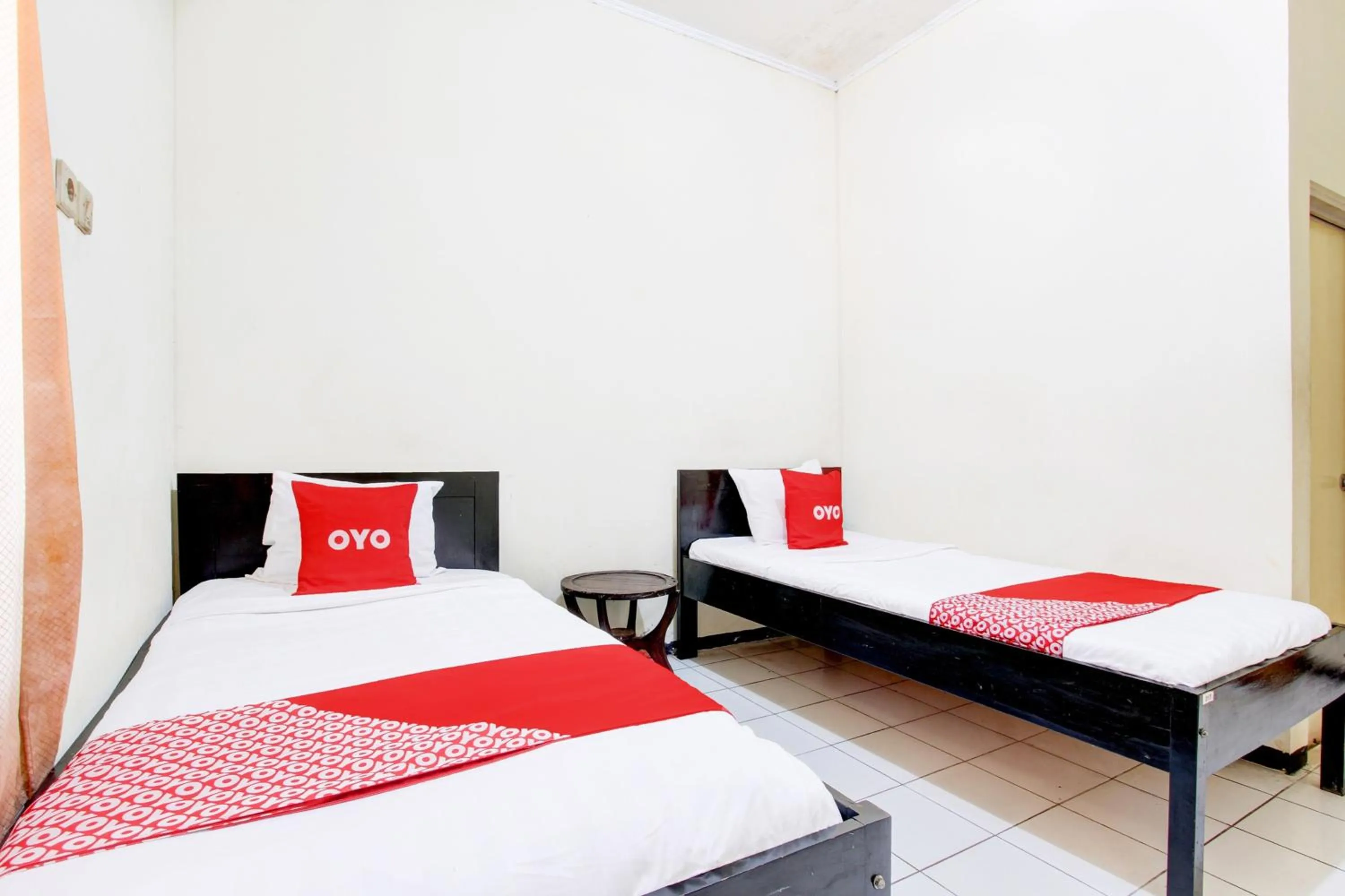 Bedroom in OYO 93048 Hotel Puri Mandiri