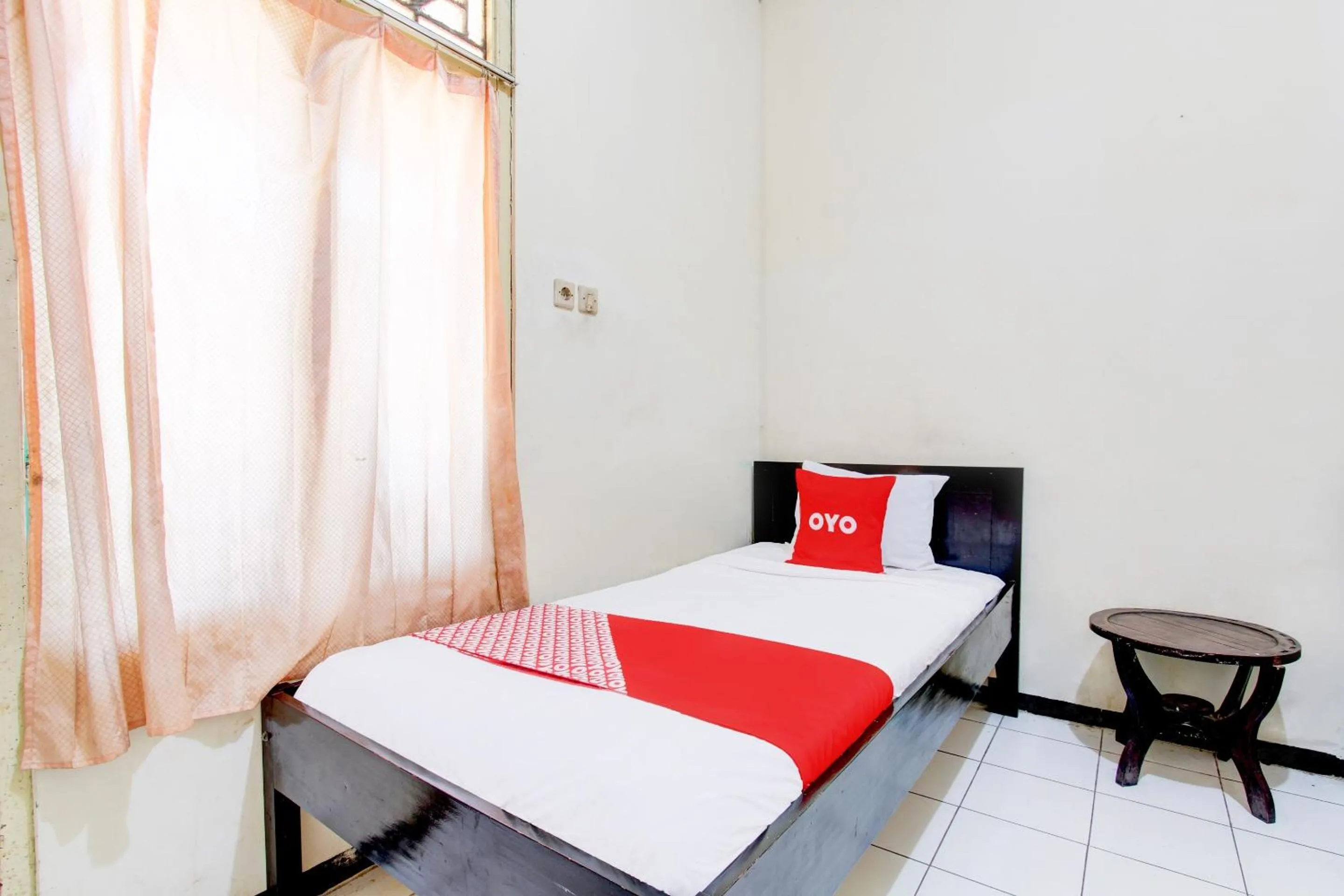 Bedroom in OYO 93048 Hotel Puri Mandiri