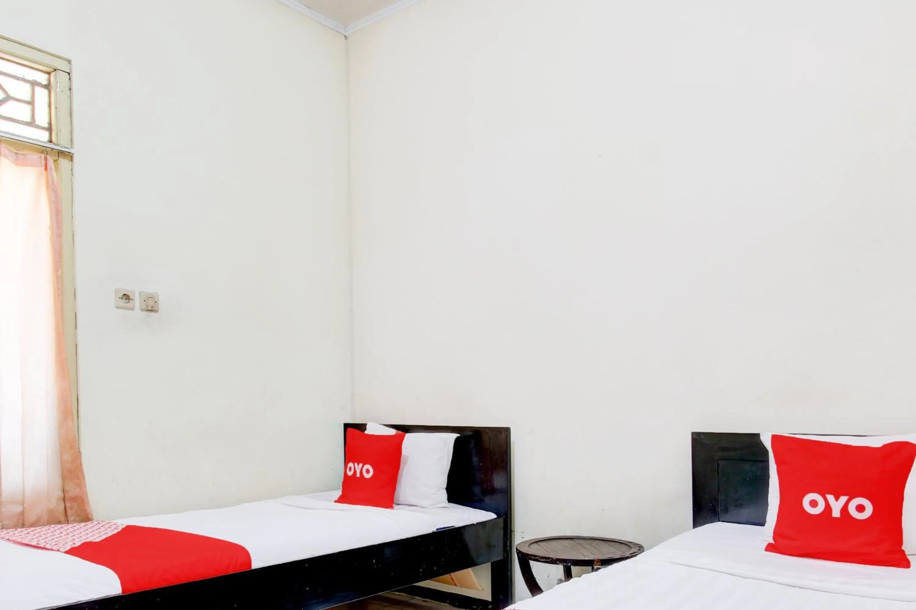 Bedroom in OYO 93048 Hotel Puri Mandiri