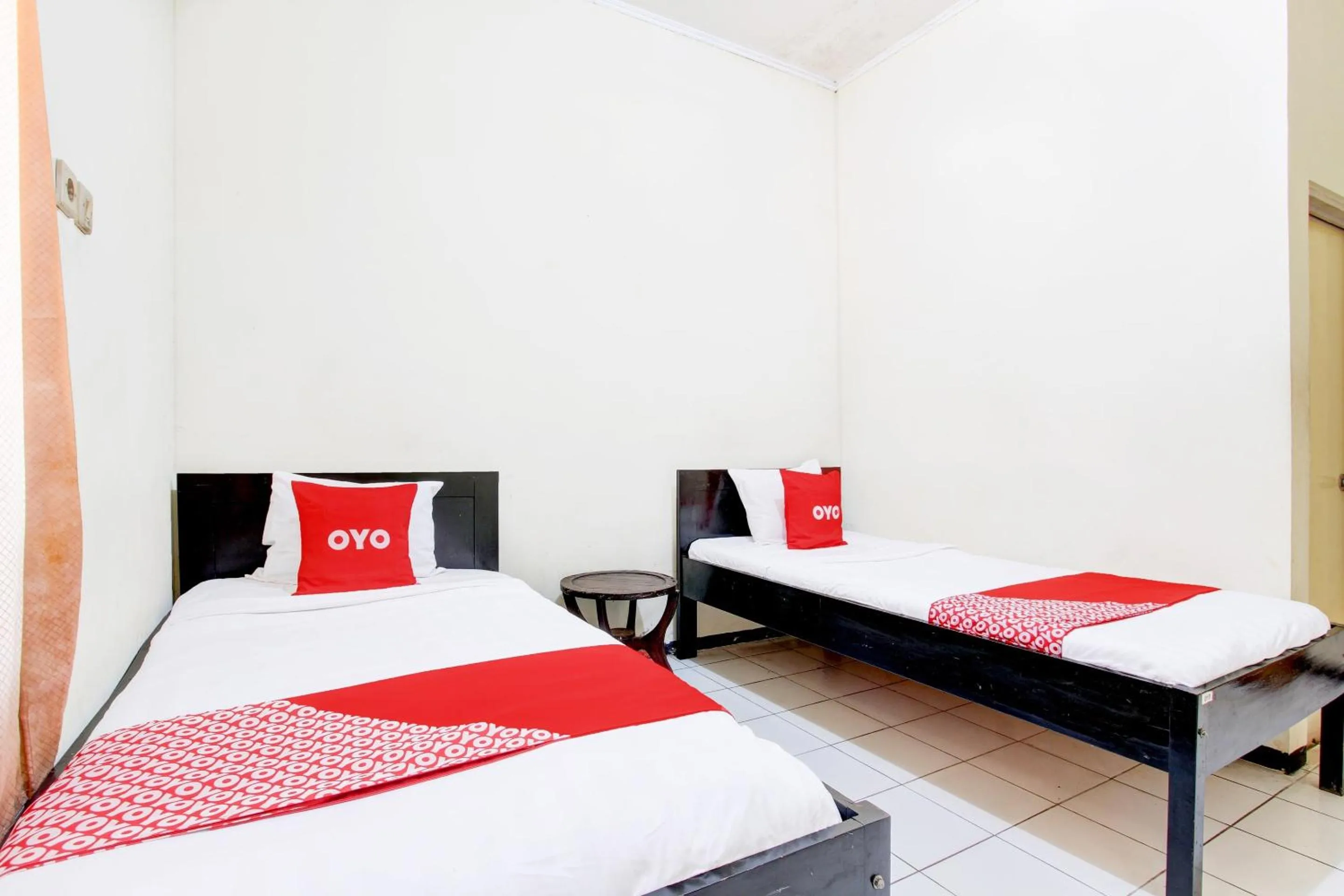 Bedroom in OYO 93048 Hotel Puri Mandiri