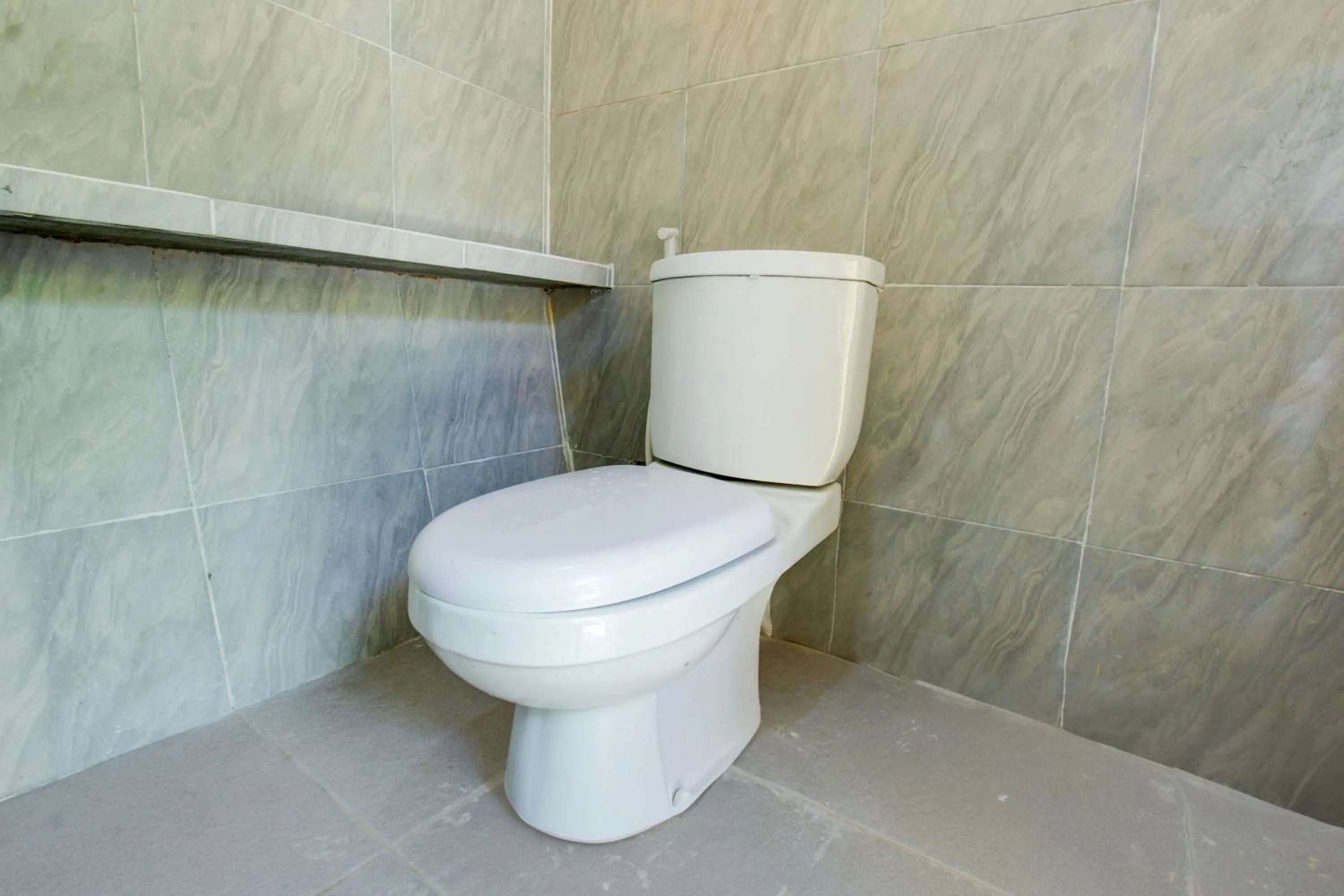 Bathroom in Hotel O Kost Gayus