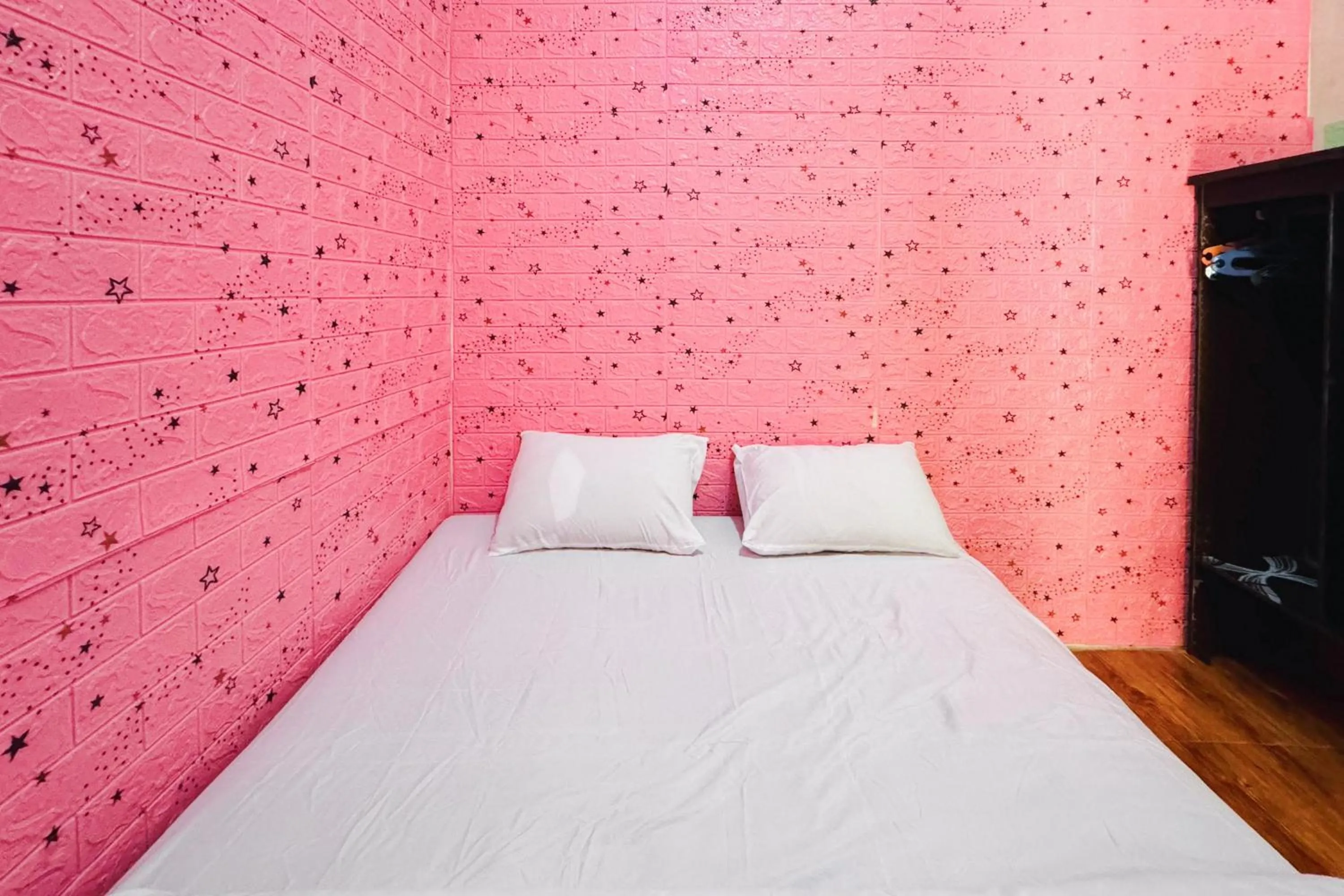 Bedroom, Bed in Penginapan Dison RedPartner