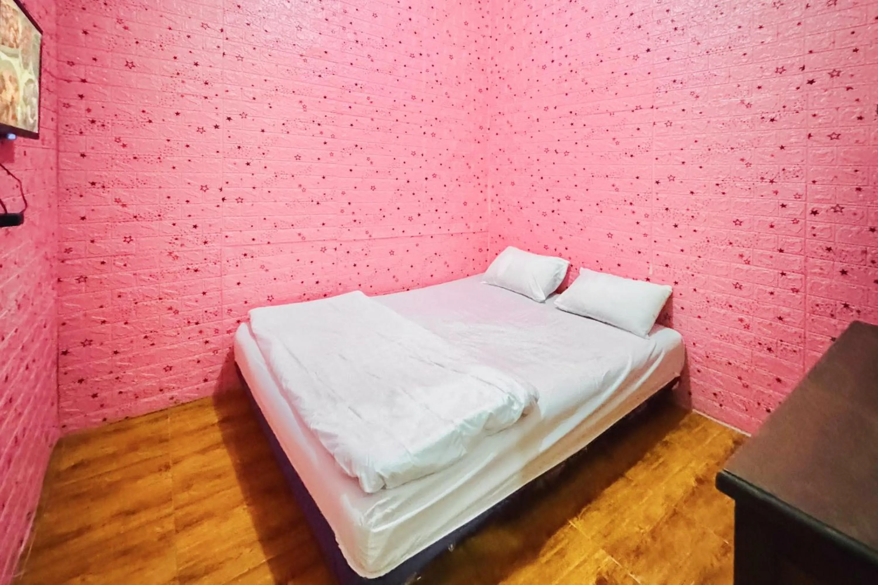 Bedroom, Bed in Penginapan Dison RedPartner