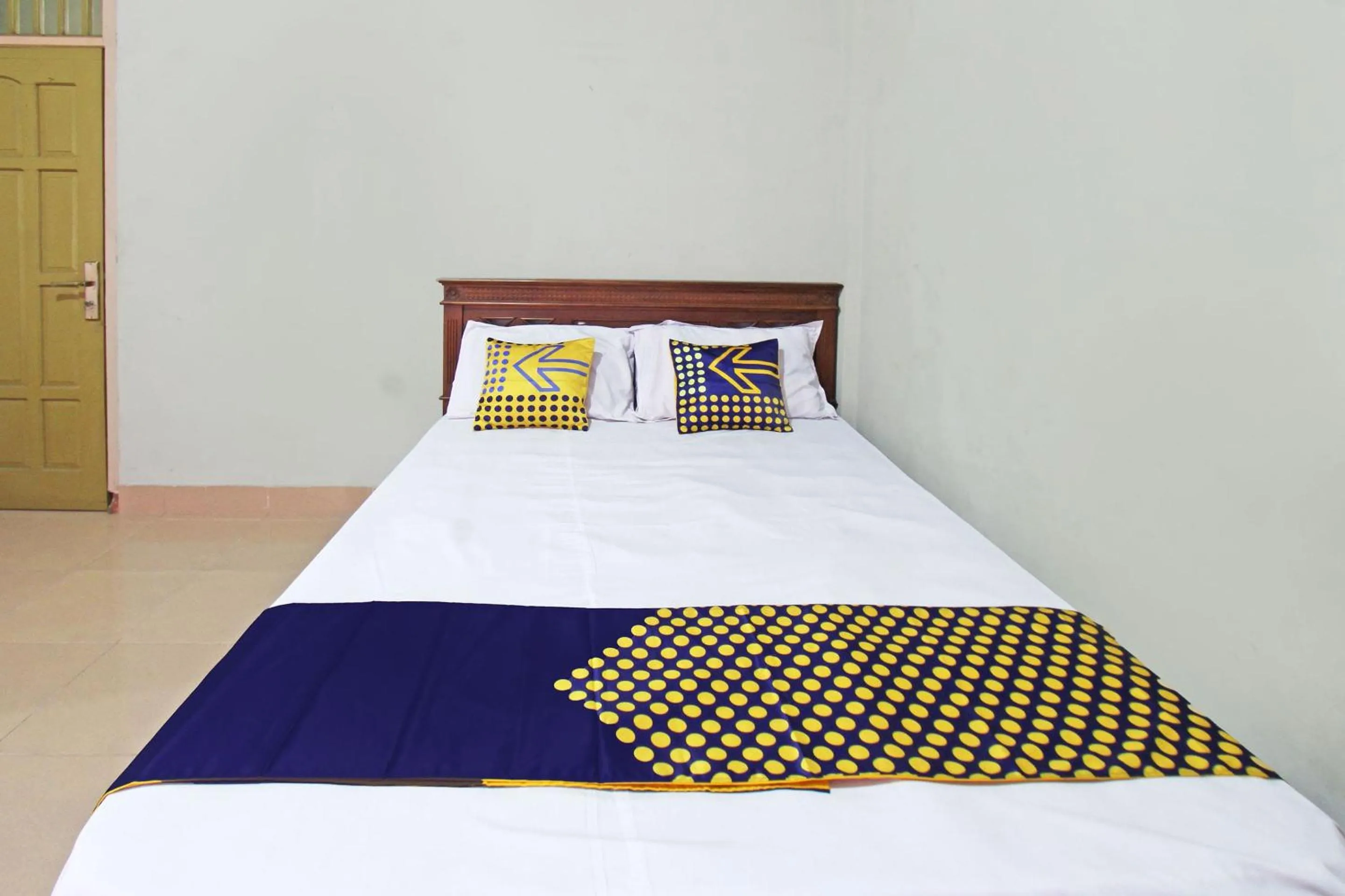 Bedroom in SPOT ON 92973 Madani Syariah Guesthouse