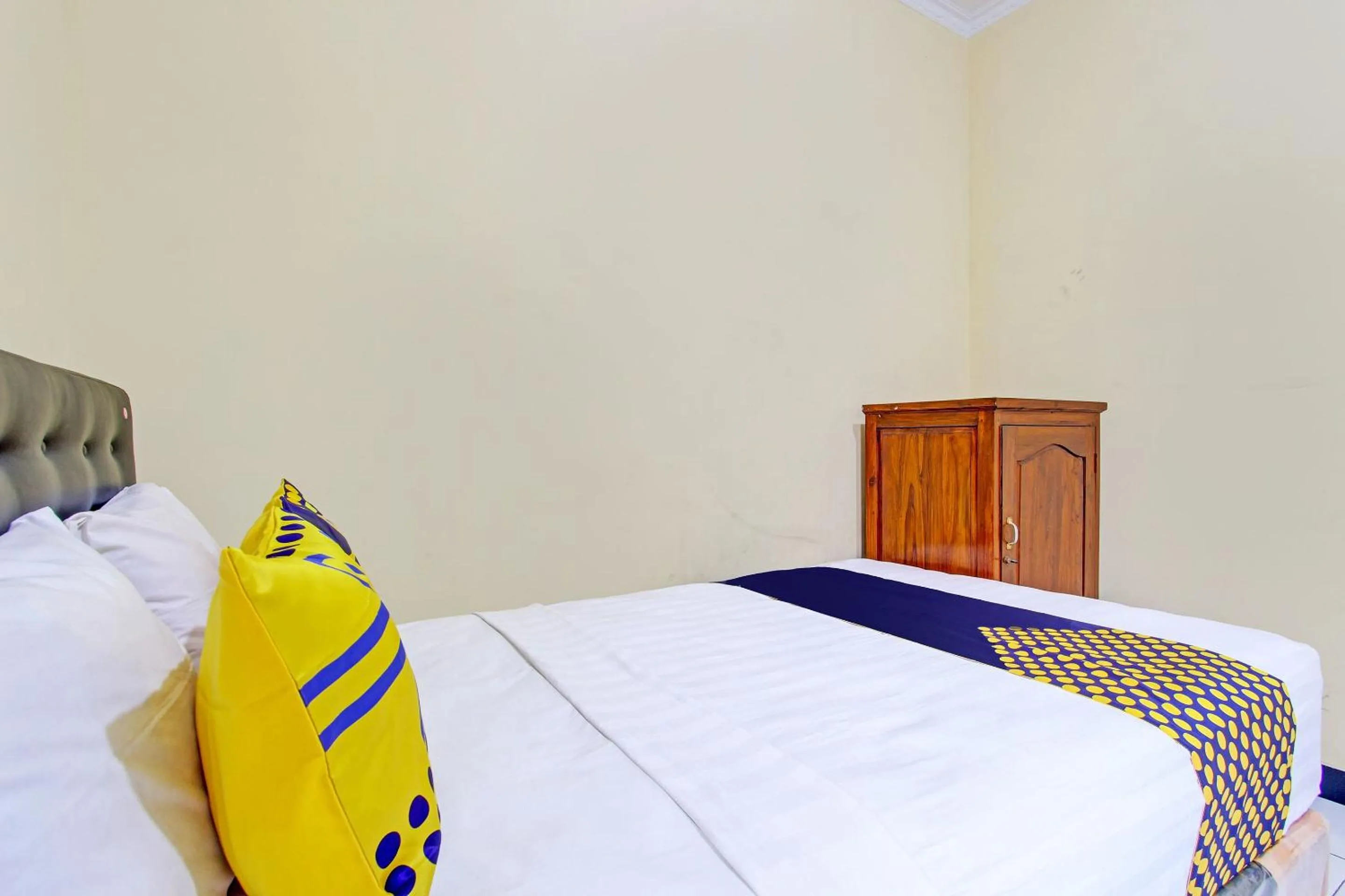 Bedroom in SPOT ON 93007 Guest House Lestari