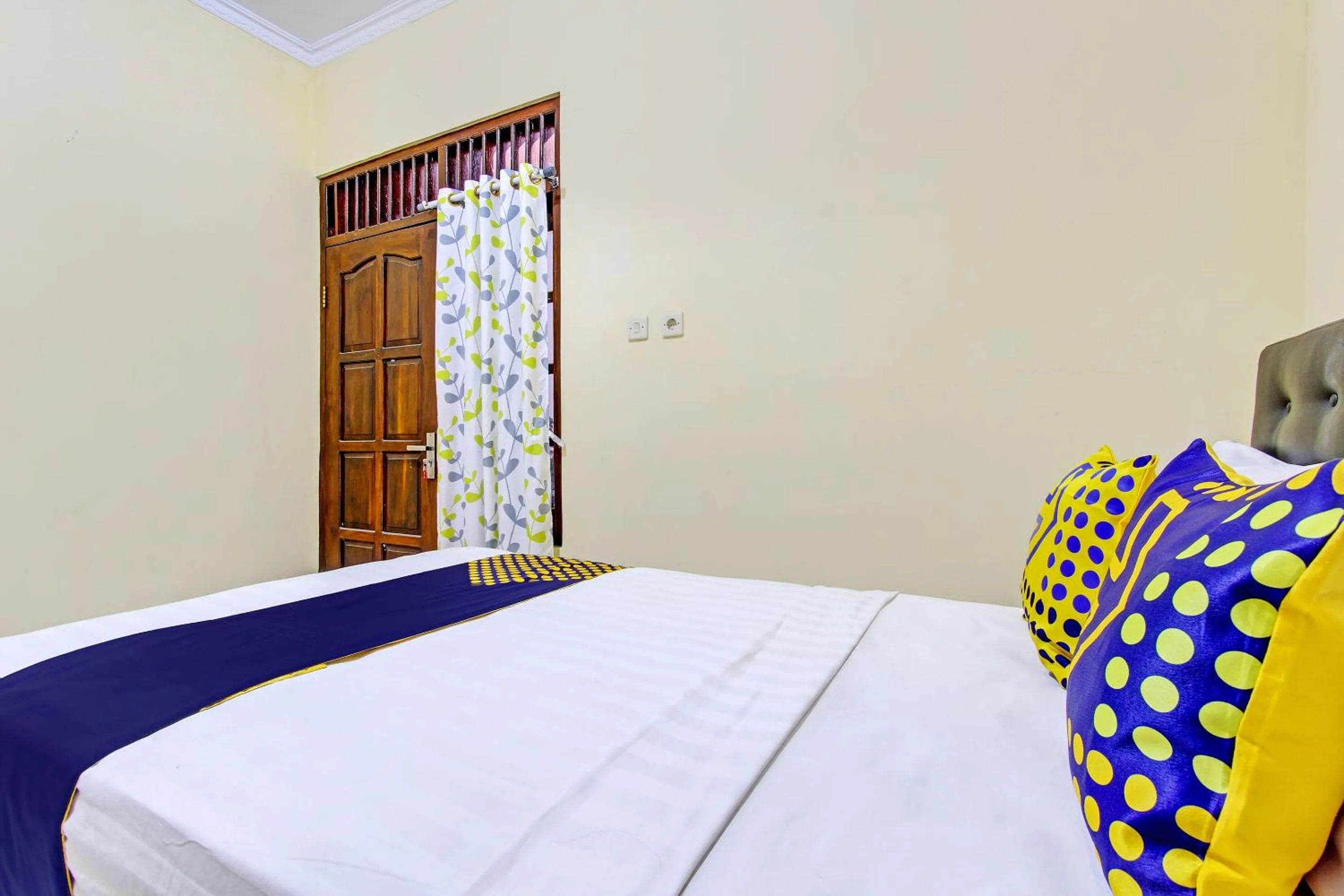Bedroom in SPOT ON 93007 Guest House Lestari