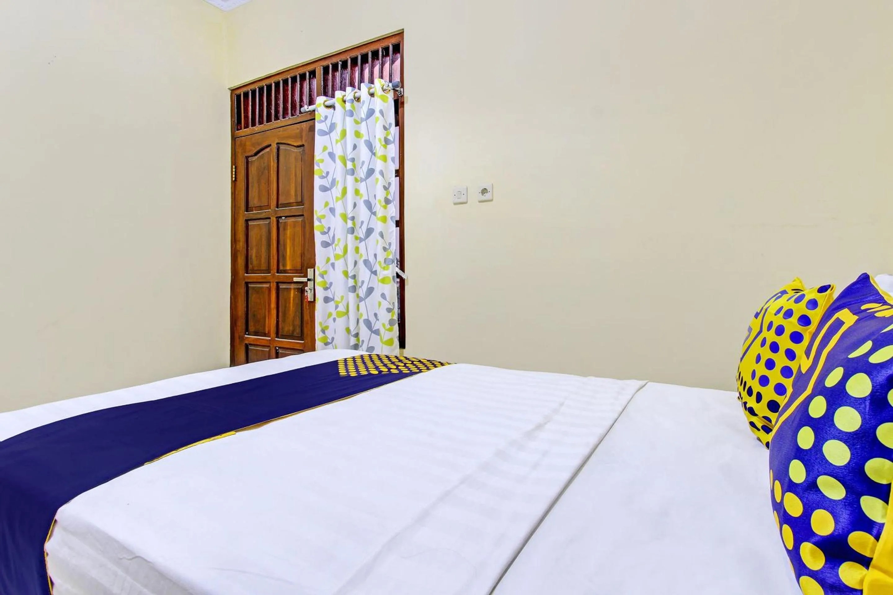 Bedroom in SPOT ON 93007 Guest House Lestari