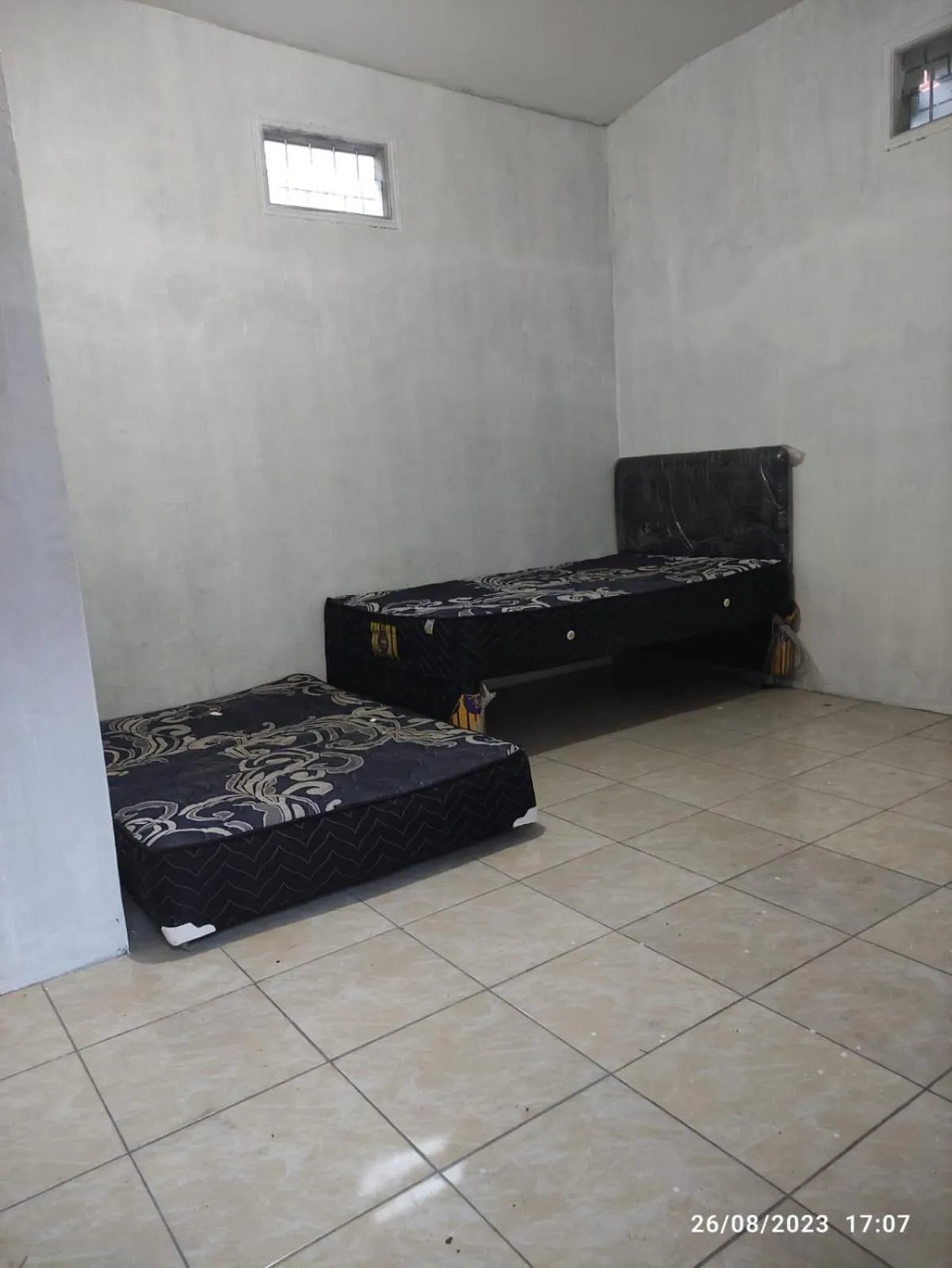 Bedroom in Hotel O Lina Homestay Syariah