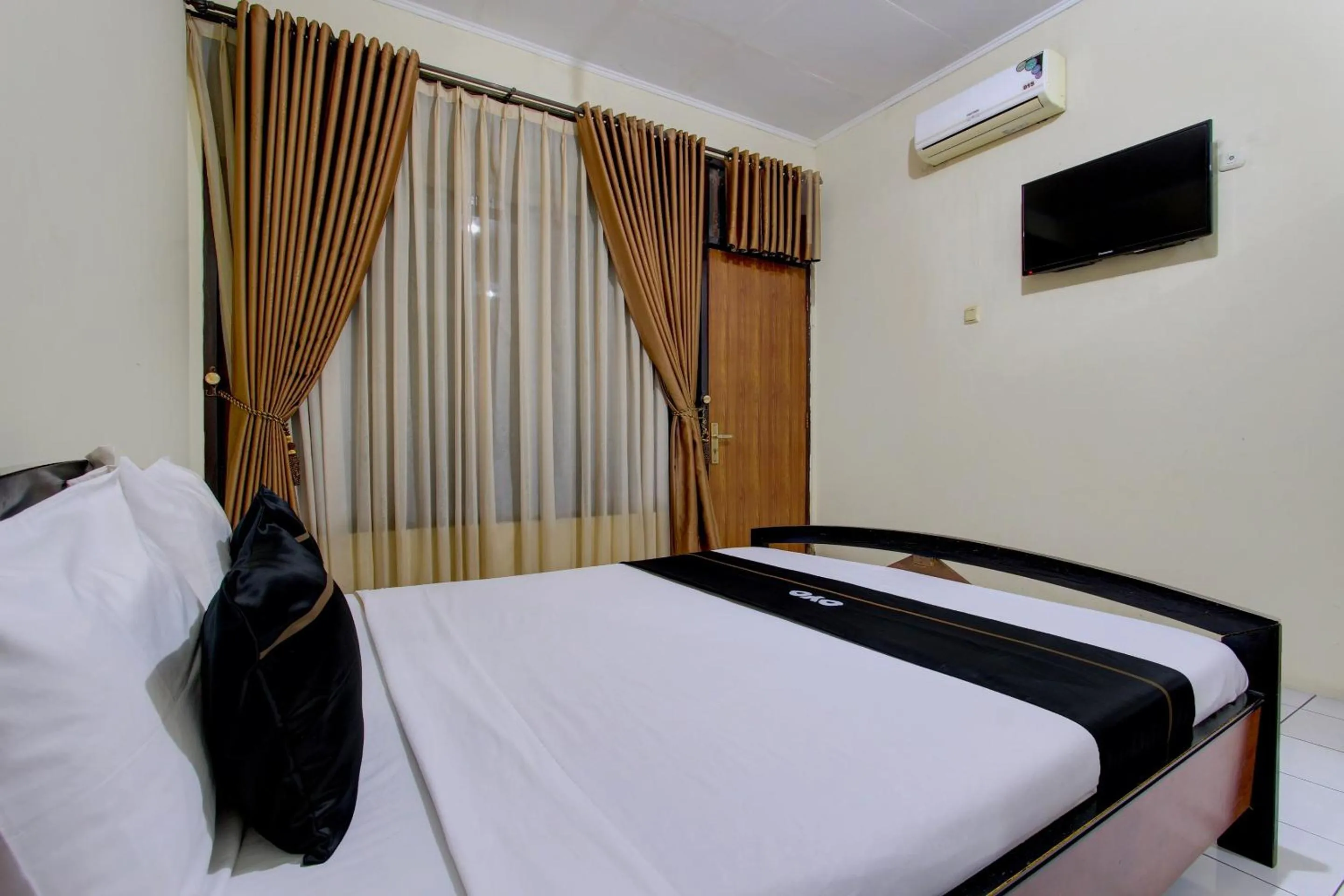 Bedroom in Capital O 93024 Hotel Ganesha