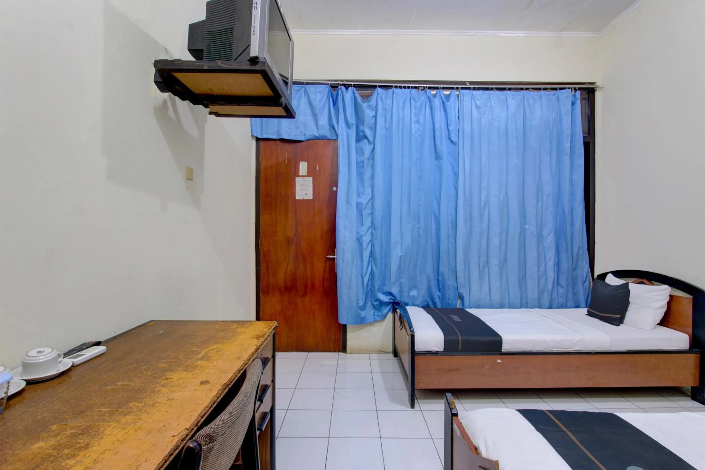 Bedroom in Capital O 93024 Hotel Ganesha