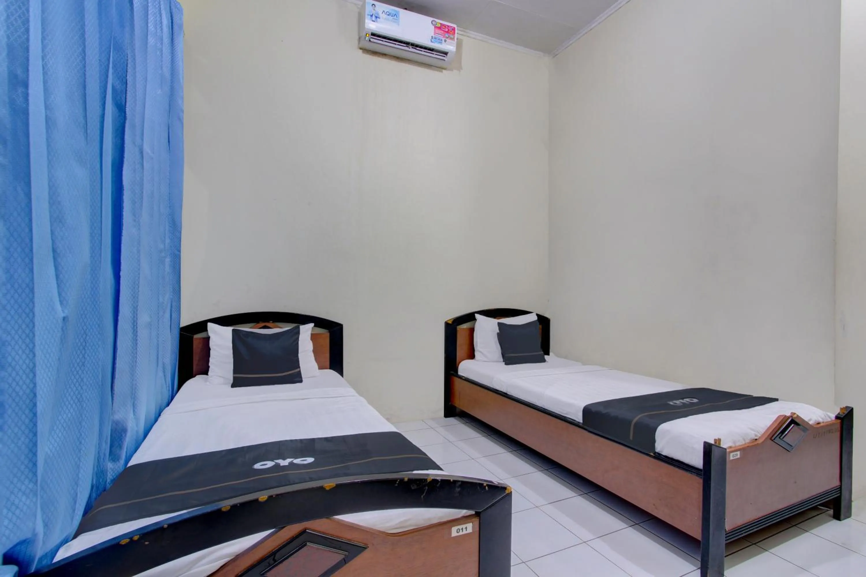 Bedroom in Capital O 93024 Hotel Ganesha