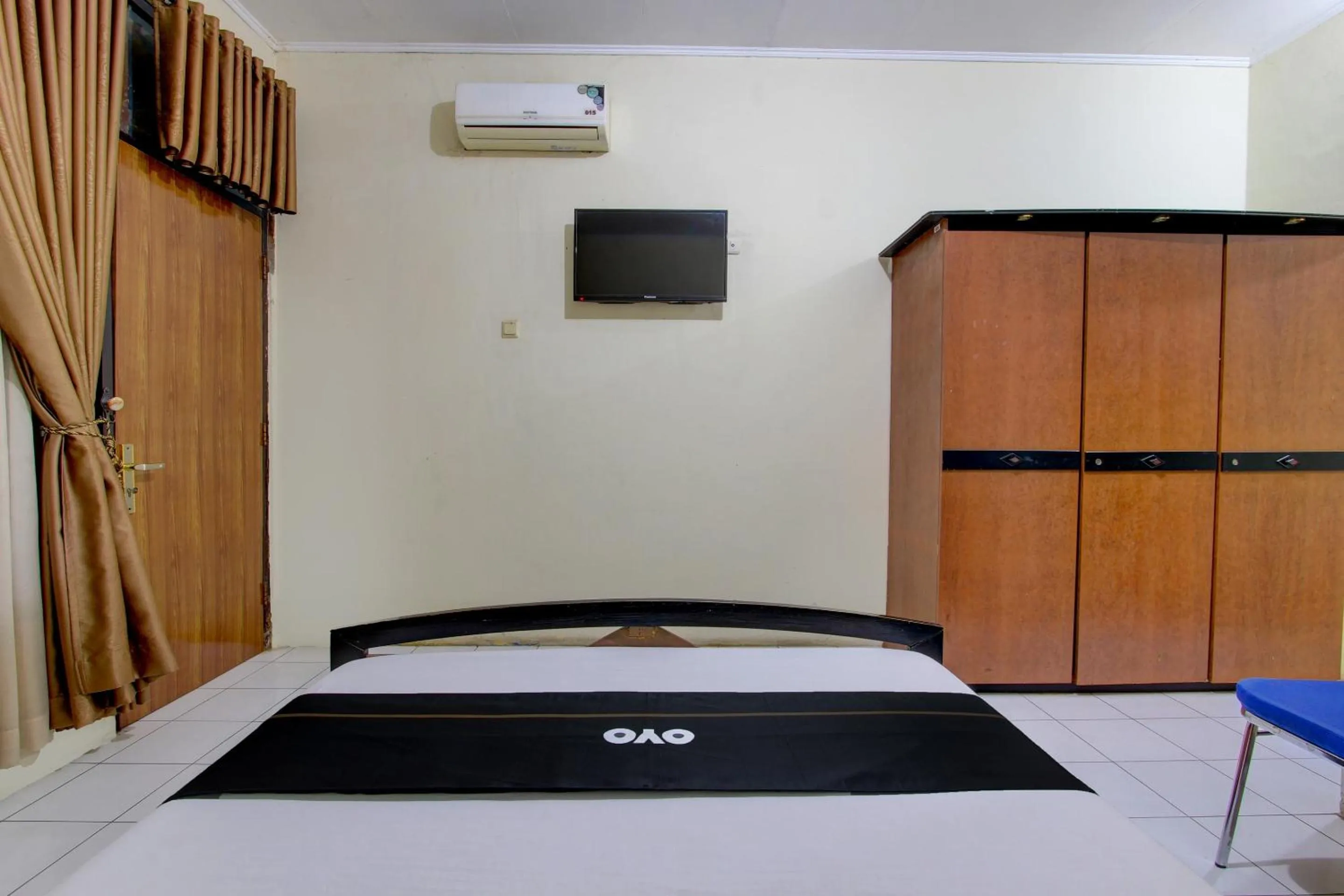 Bedroom in Capital O 93024 Hotel Ganesha