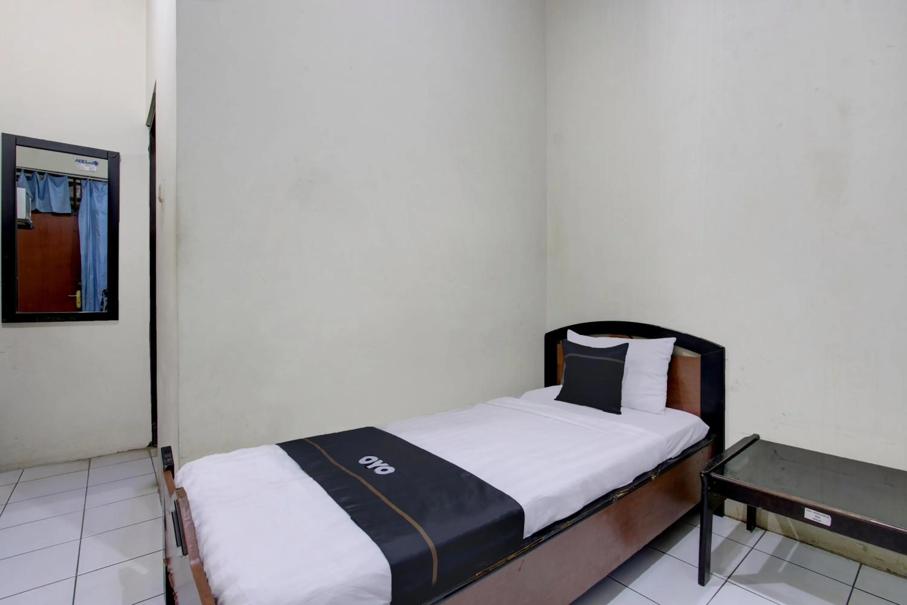 Bedroom in Capital O 93024 Hotel Ganesha