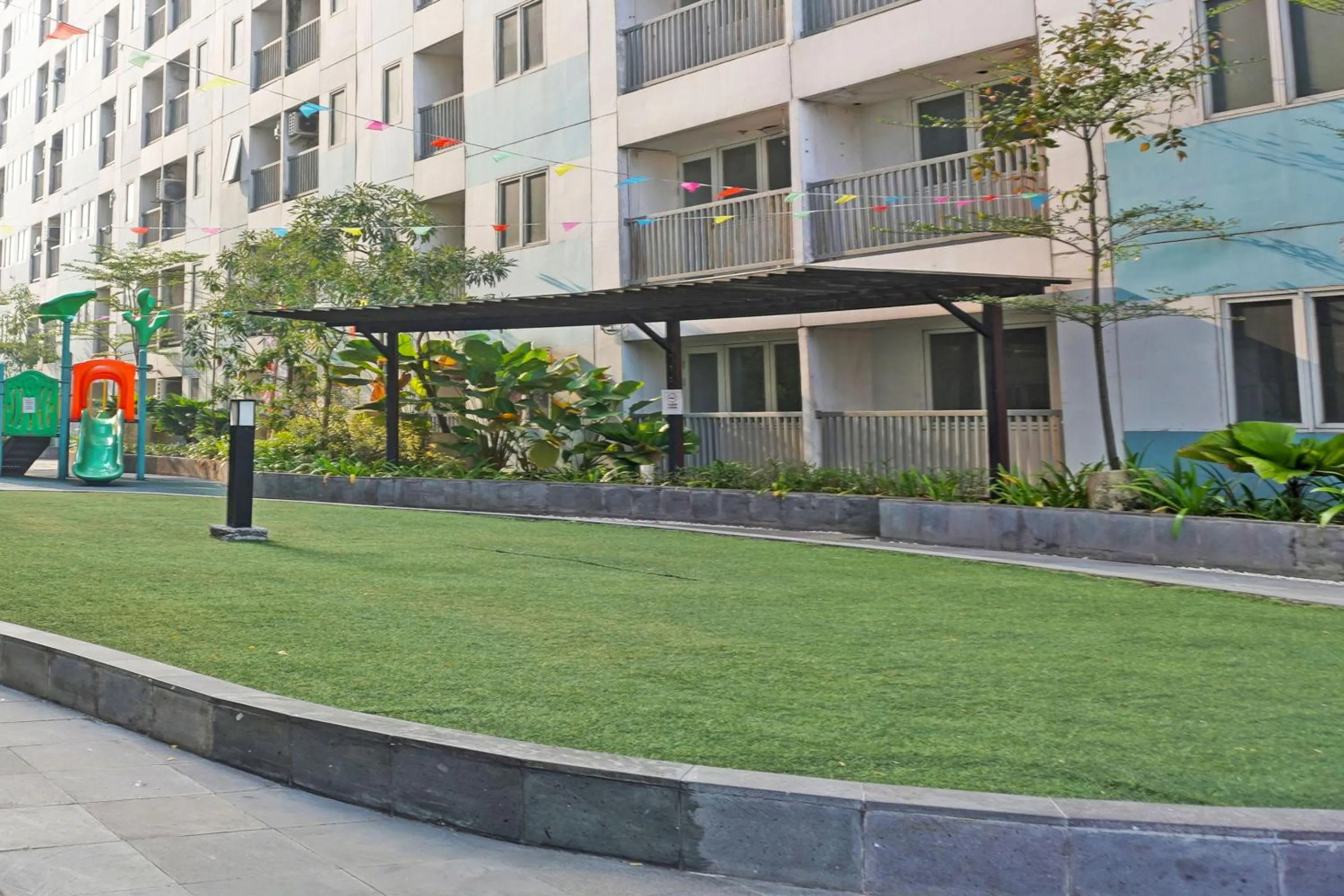 Facade/entrance in Collection O 92959 Apartement Sentraland Karawang By AT Room