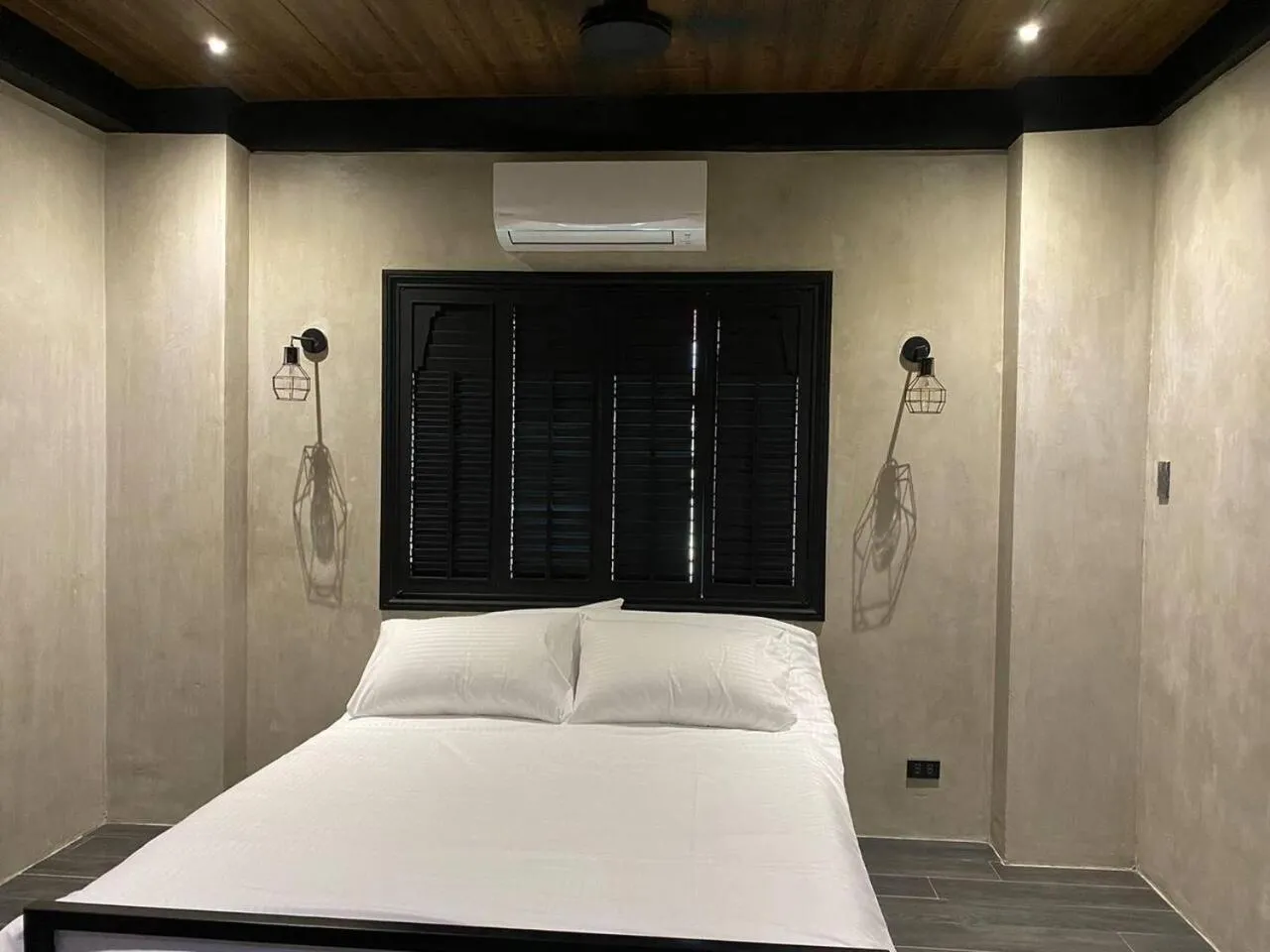 Bed in Spacious Beachfront Unit at Canyon Cove Nasugbu