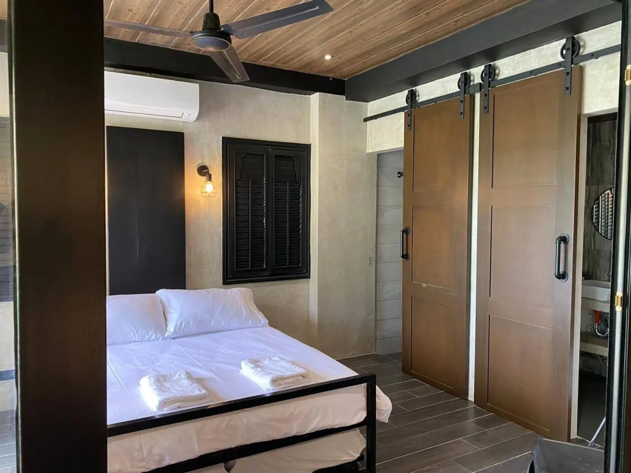 Bed in Spacious Beachfront Unit at Canyon Cove Nasugbu