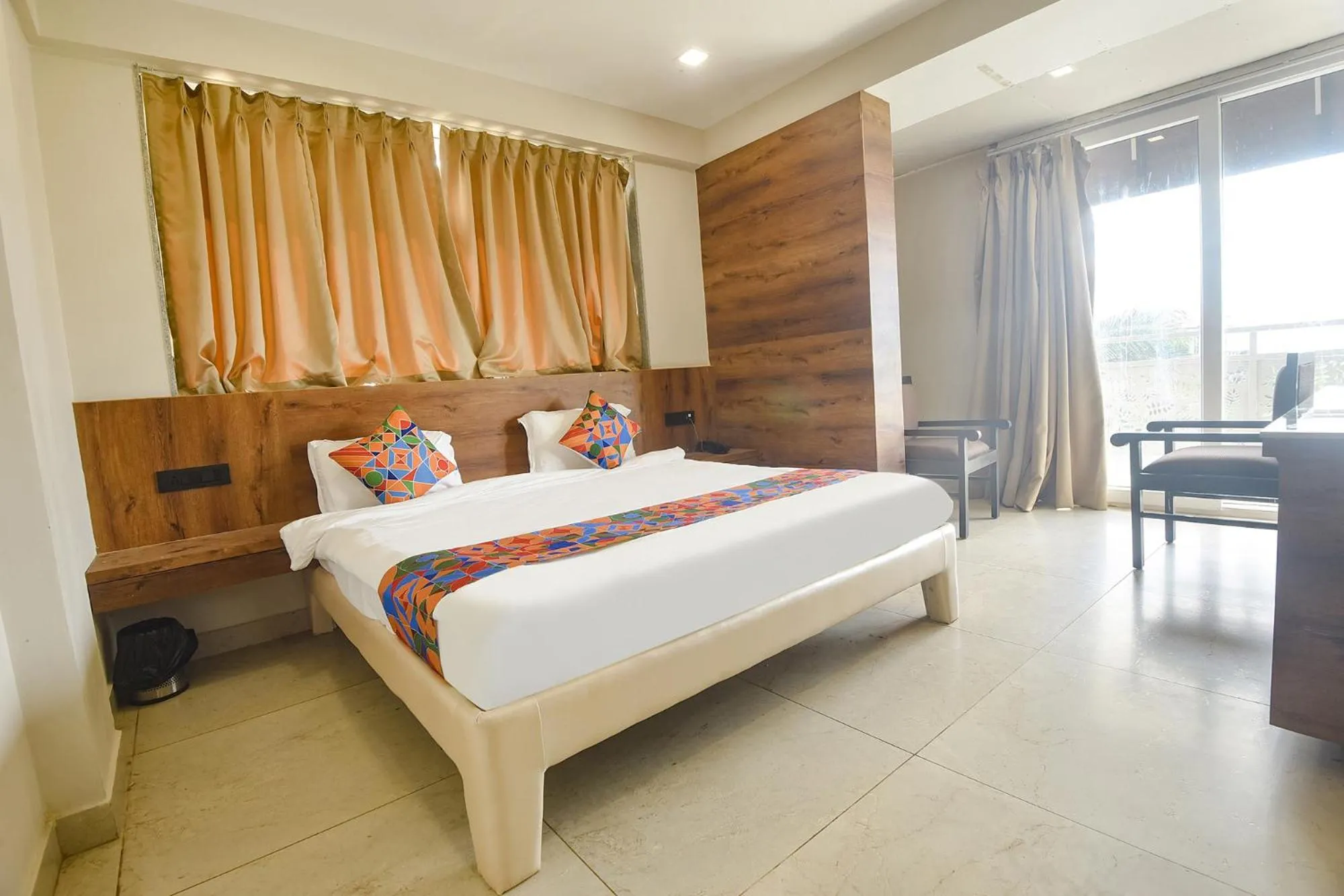 Bed in FabHotel Avasa Grand - Nr Big Daddy Casino