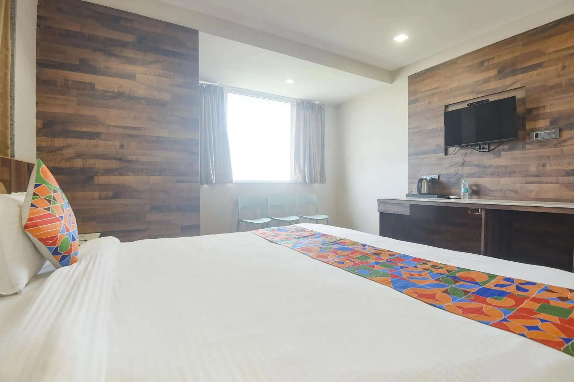 Bed in FabHotel Avasa Grand - Nr Big Daddy Casino