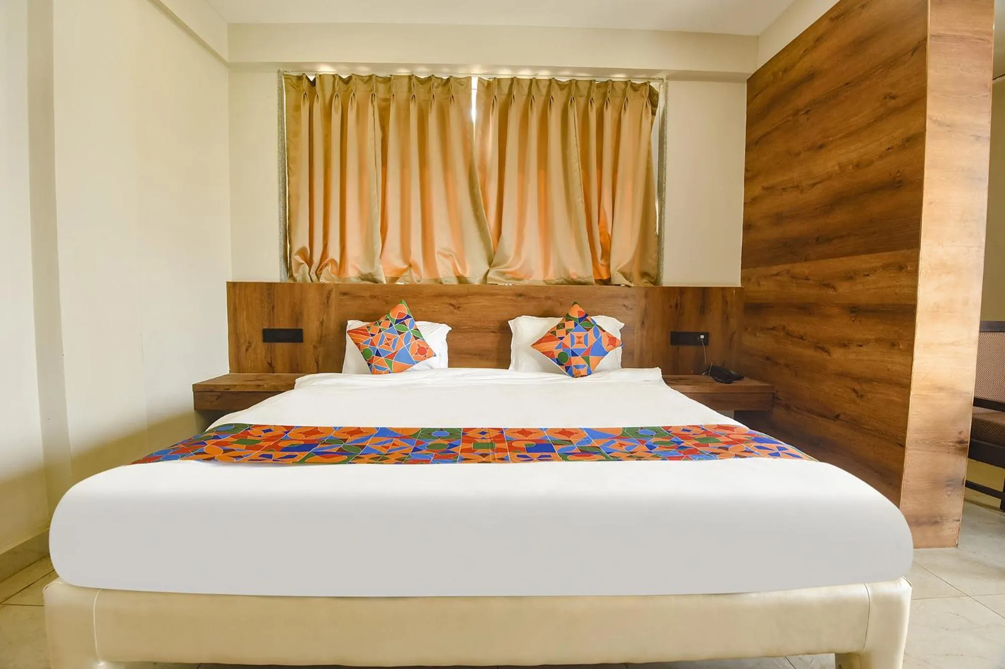 Bed in FabHotel Avasa Grand - Nr Big Daddy Casino