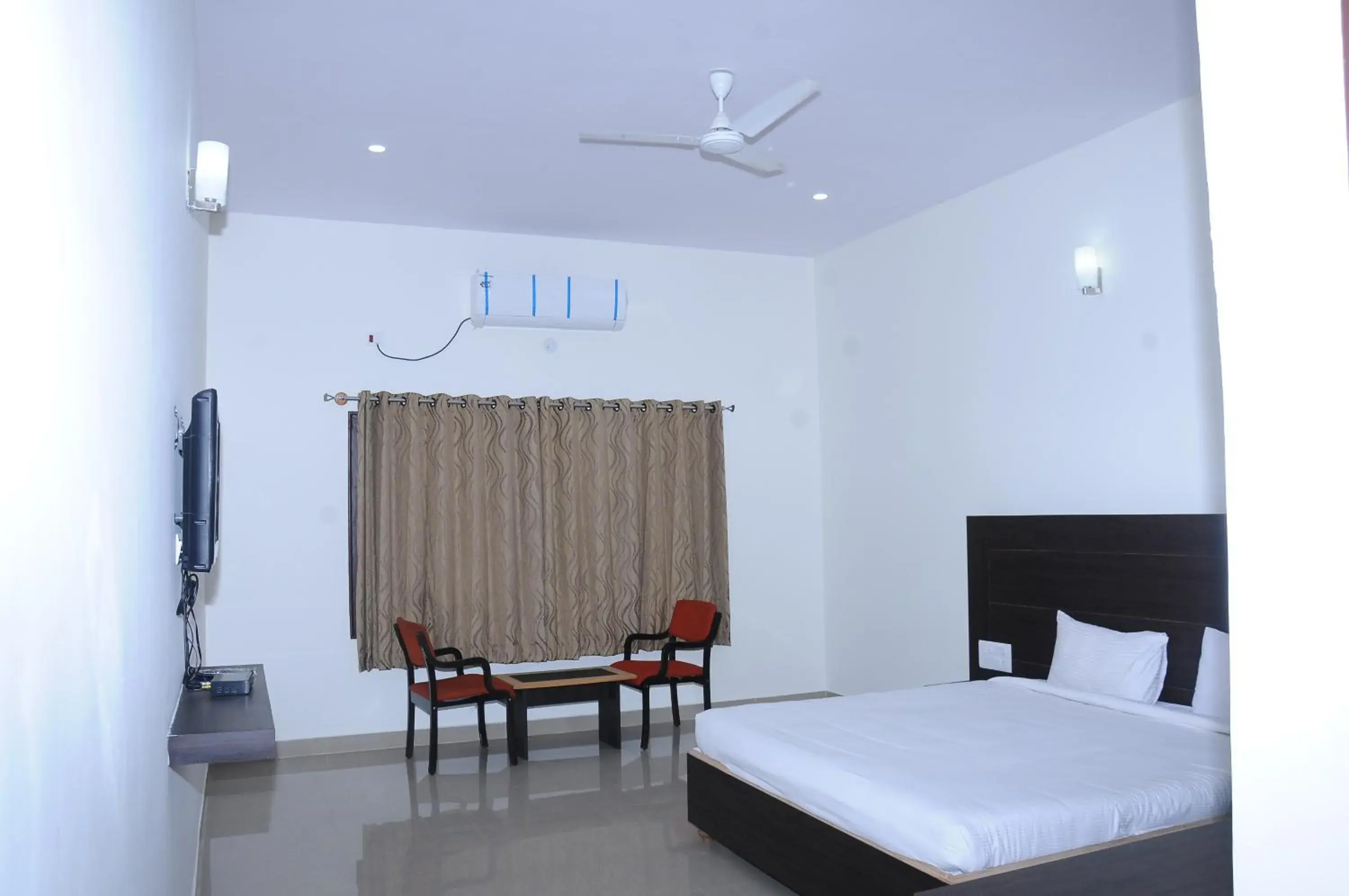 Deluxe Room in Nijaguna Residency Deluxe Room in Nijaguna Residency