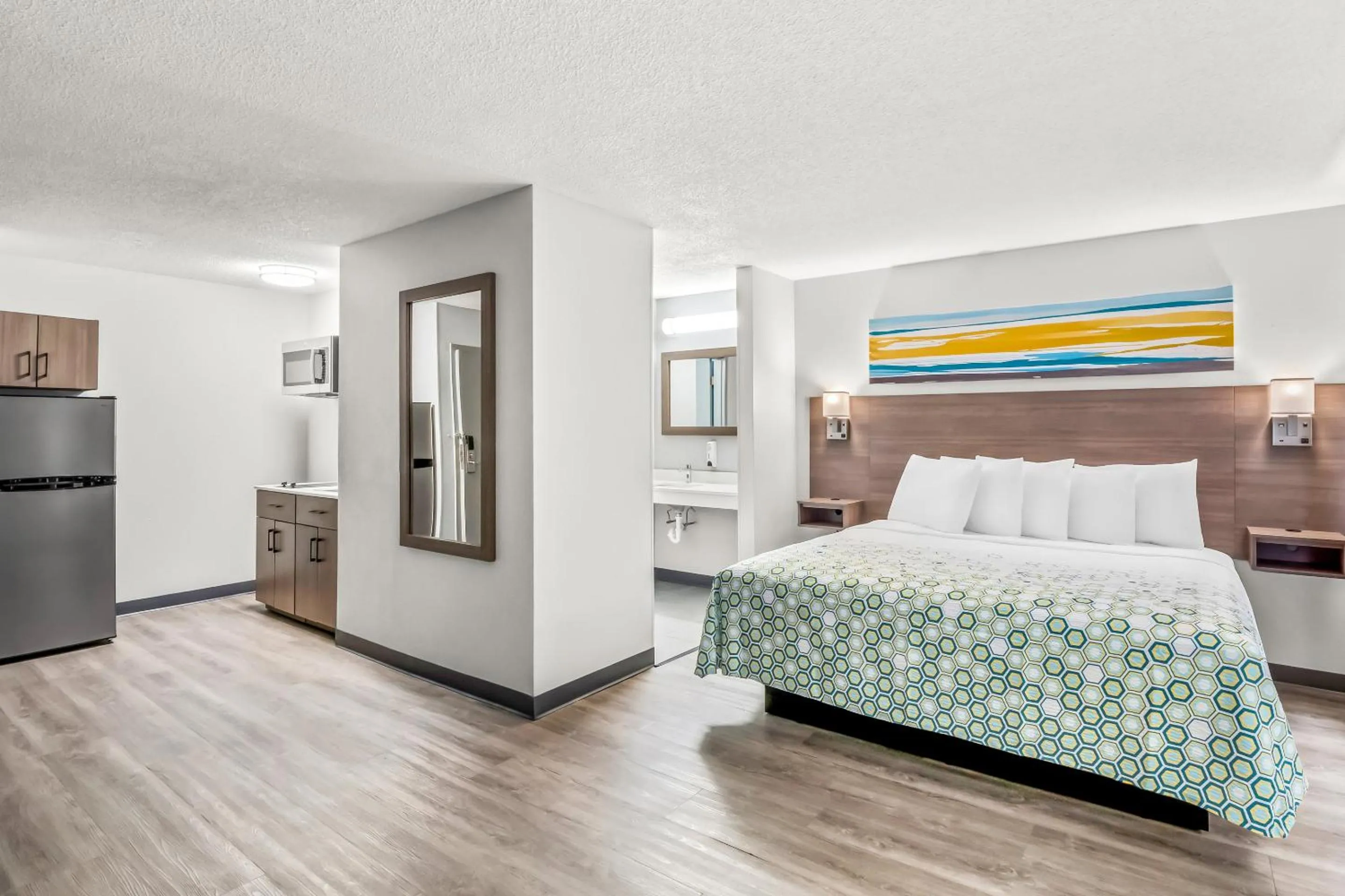 Photo of the whole room, Bed in HomeTowne Studios by Red Roof Southfield