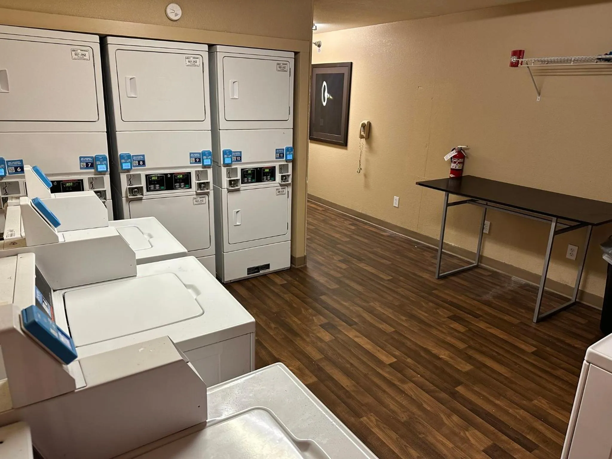 laundry in HomeTowne Studios by Red Roof Southfield