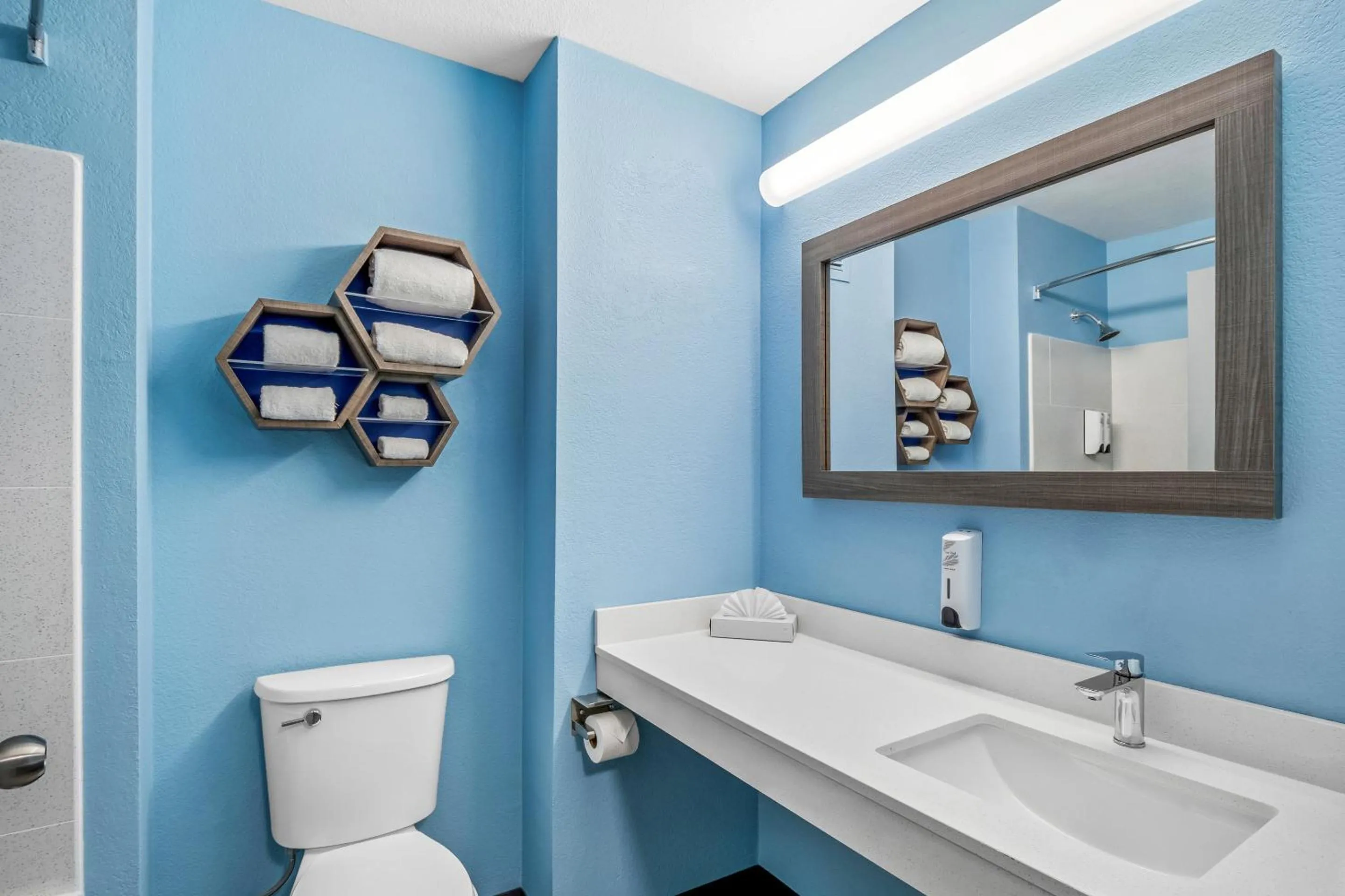 Bathroom in HomeTowne Studios by Red Roof Southfield