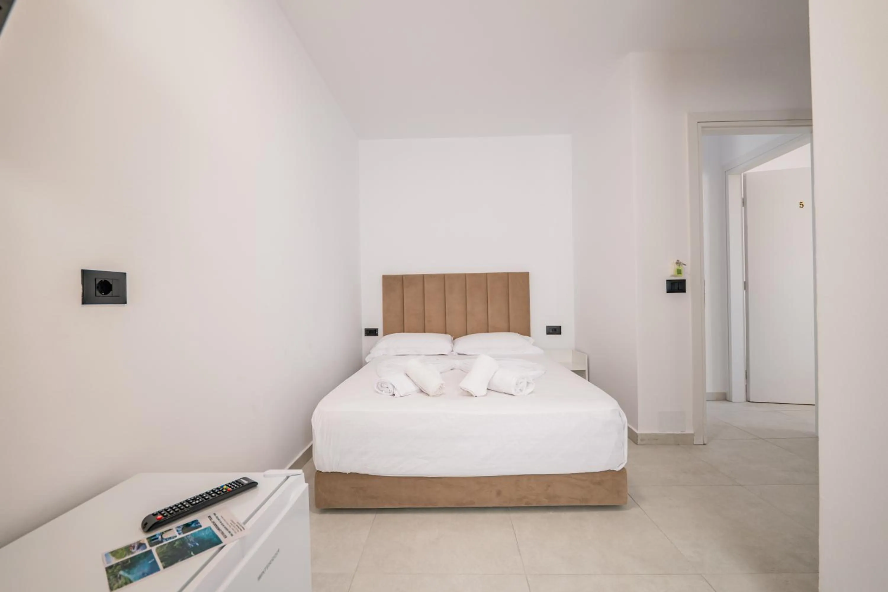 Bed in Sunset Aparthotel