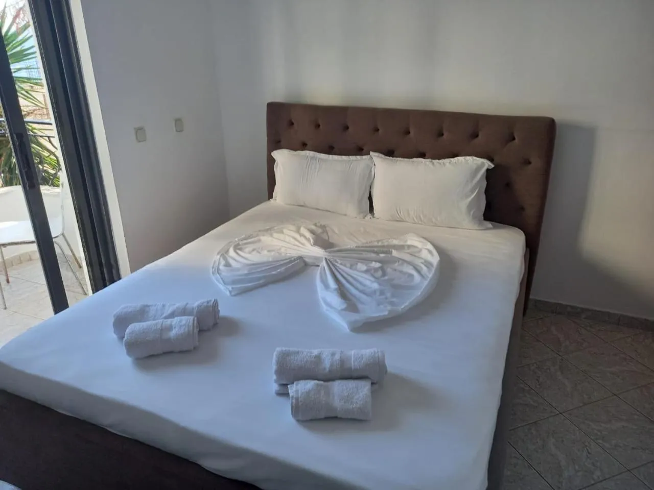 Bed in Sunset Aparthotel