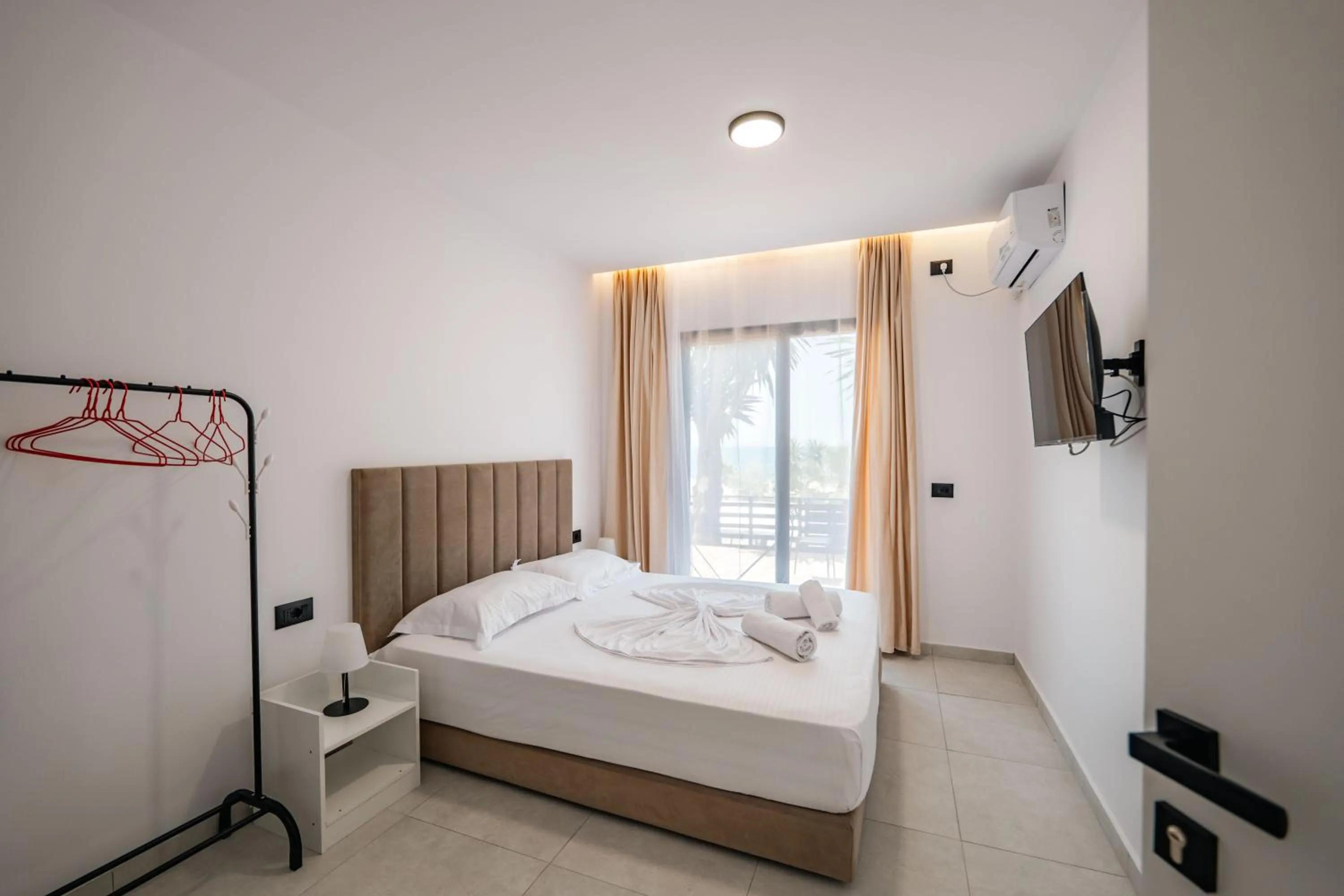 Bed in Sunset Aparthotel