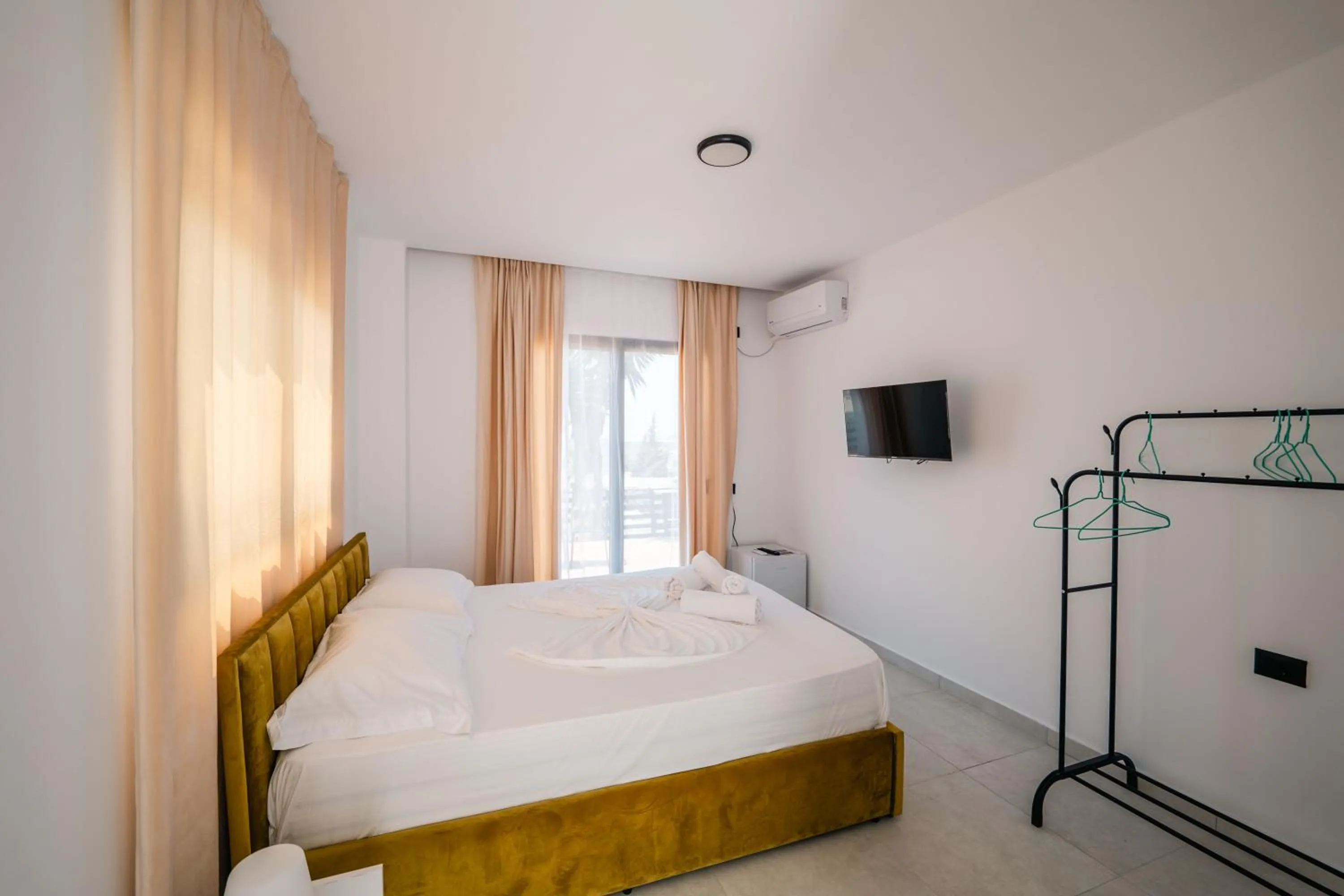 Bed in Sunset Aparthotel