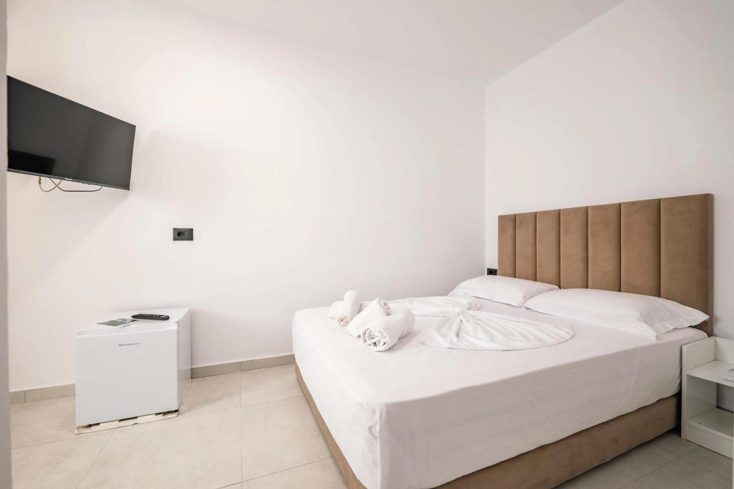 Bed in Sunset Aparthotel