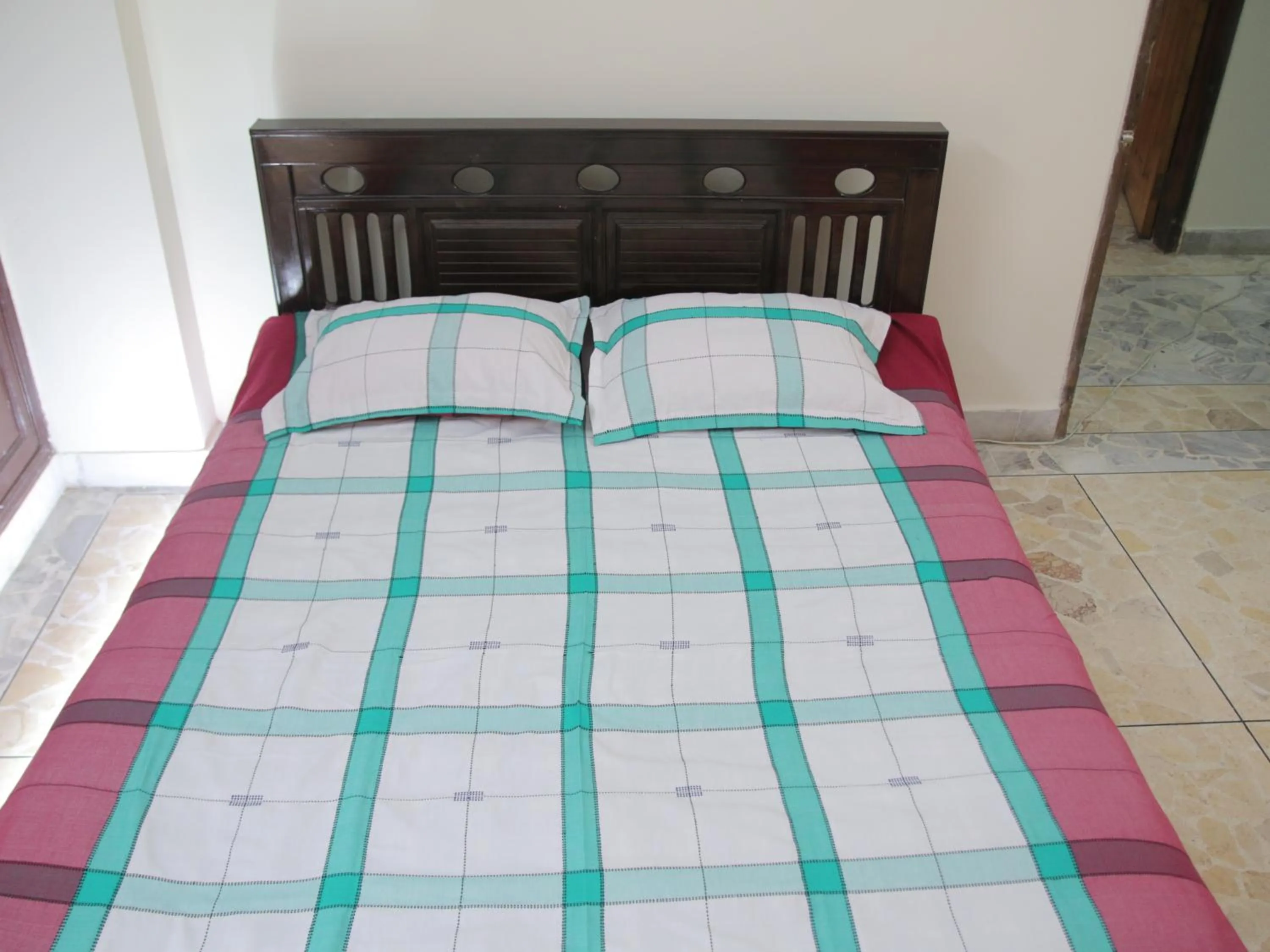 Bed in Golpata Bed & Breakfast