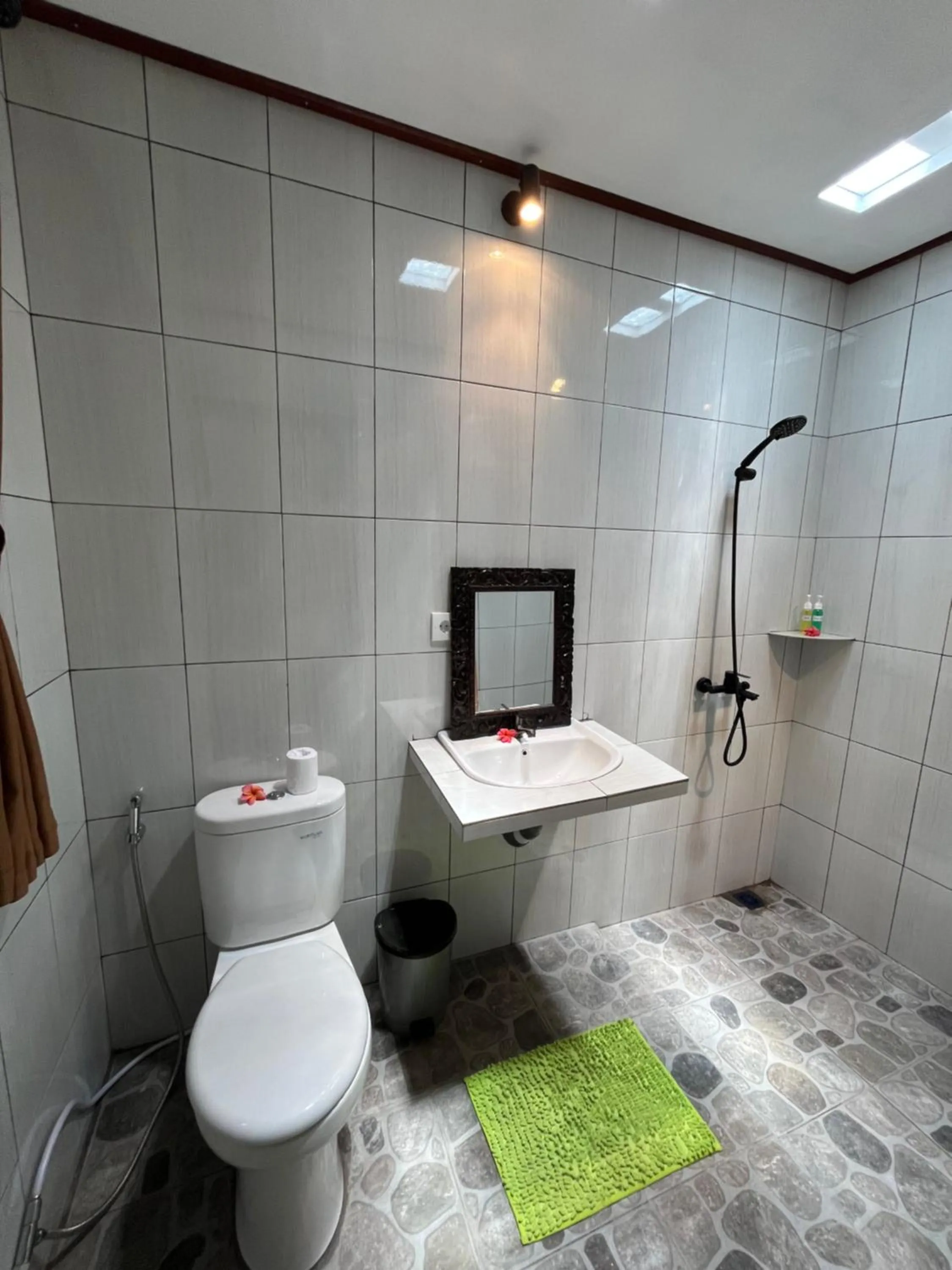 Shower in Bali Asli Guest House by EPS