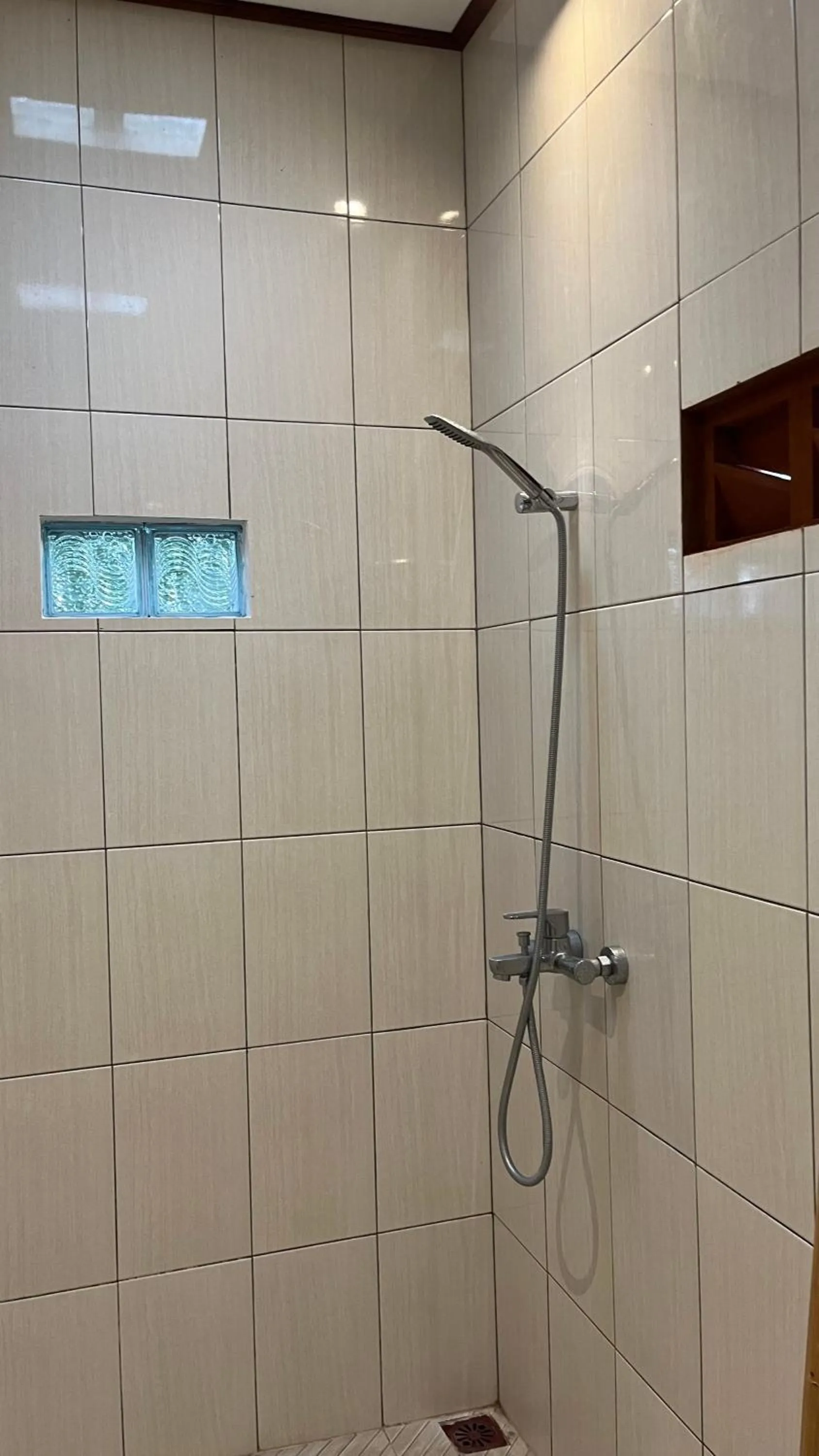 Shower in Bali Asli Guest House by EPS