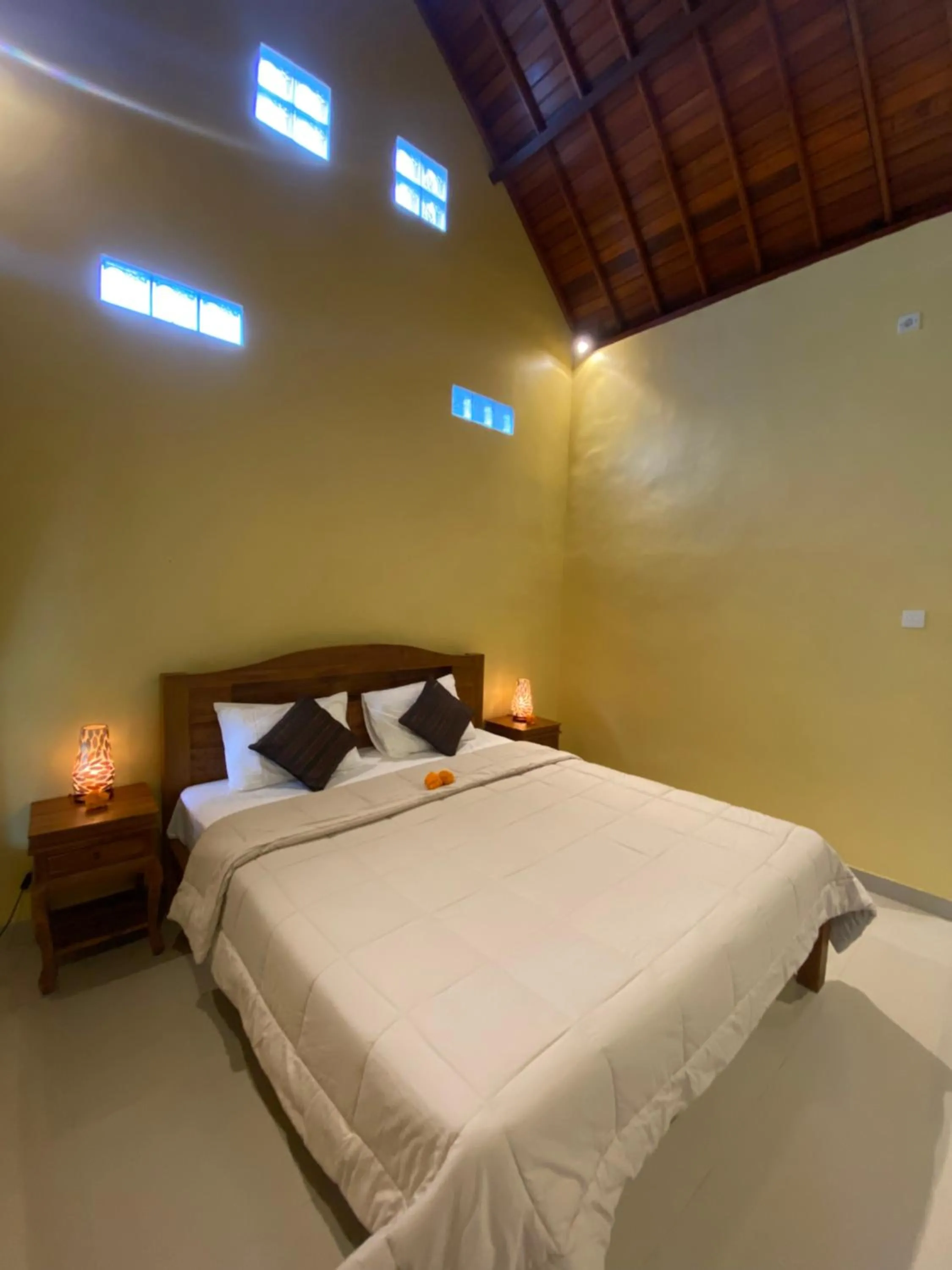 Property building, Bed in Bali Asli Guest House by EPS