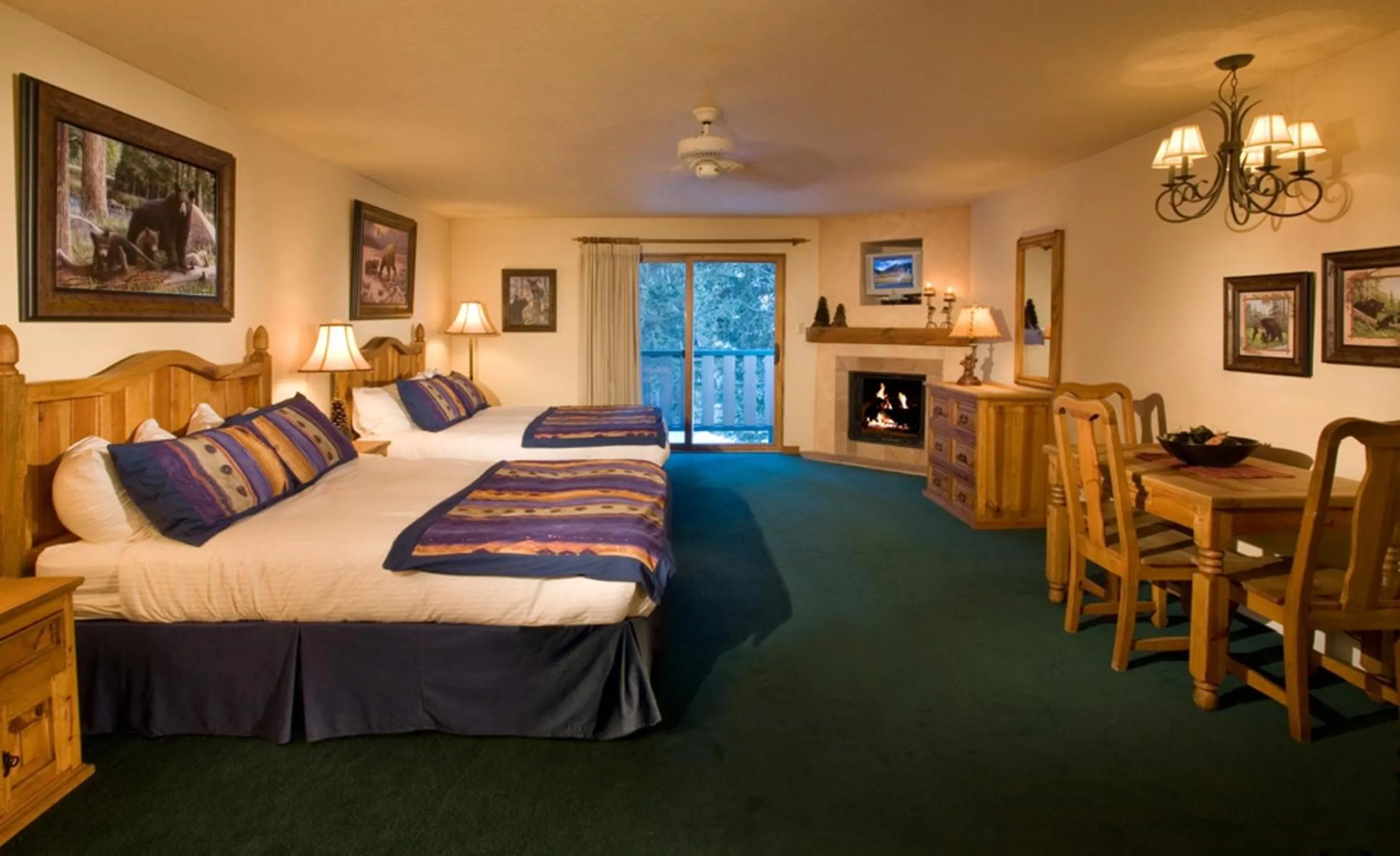 Kitchen or kitchenette, Bed in Alpine Village Suites