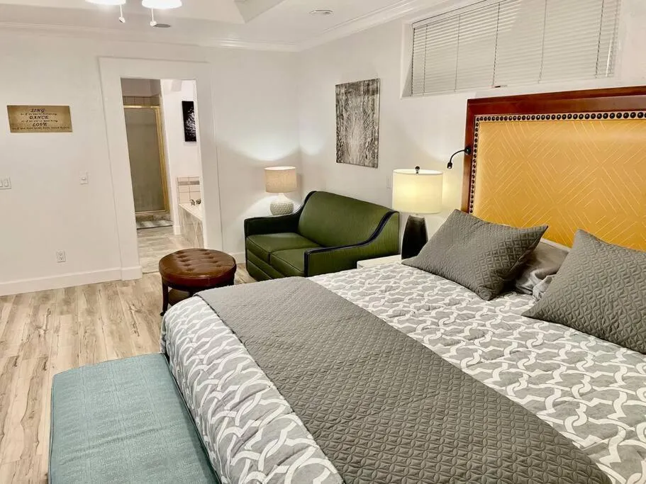 Bed in White Feather Suite Hot Tub Private Sleeps 2