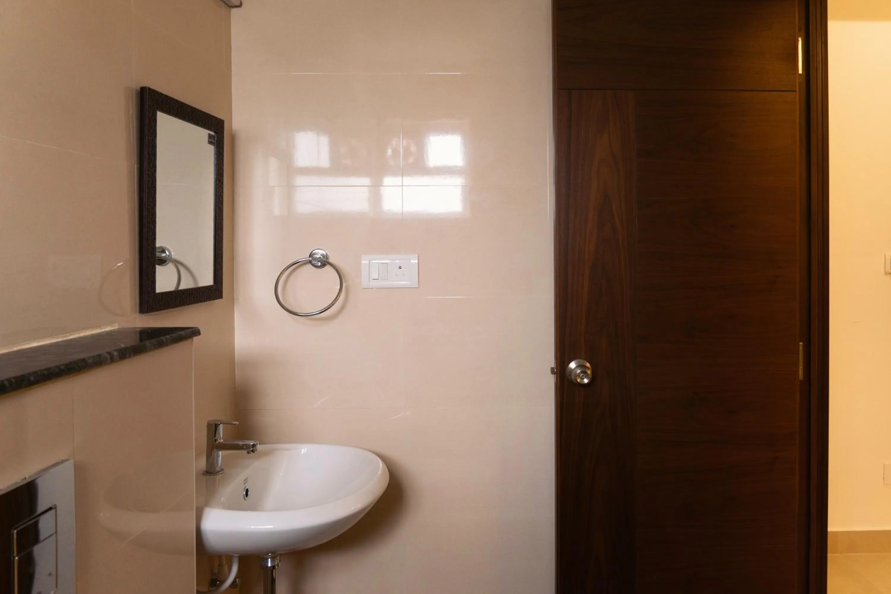 Bathroom in Flora Pavillion Near Global Hospital Perumbakkam