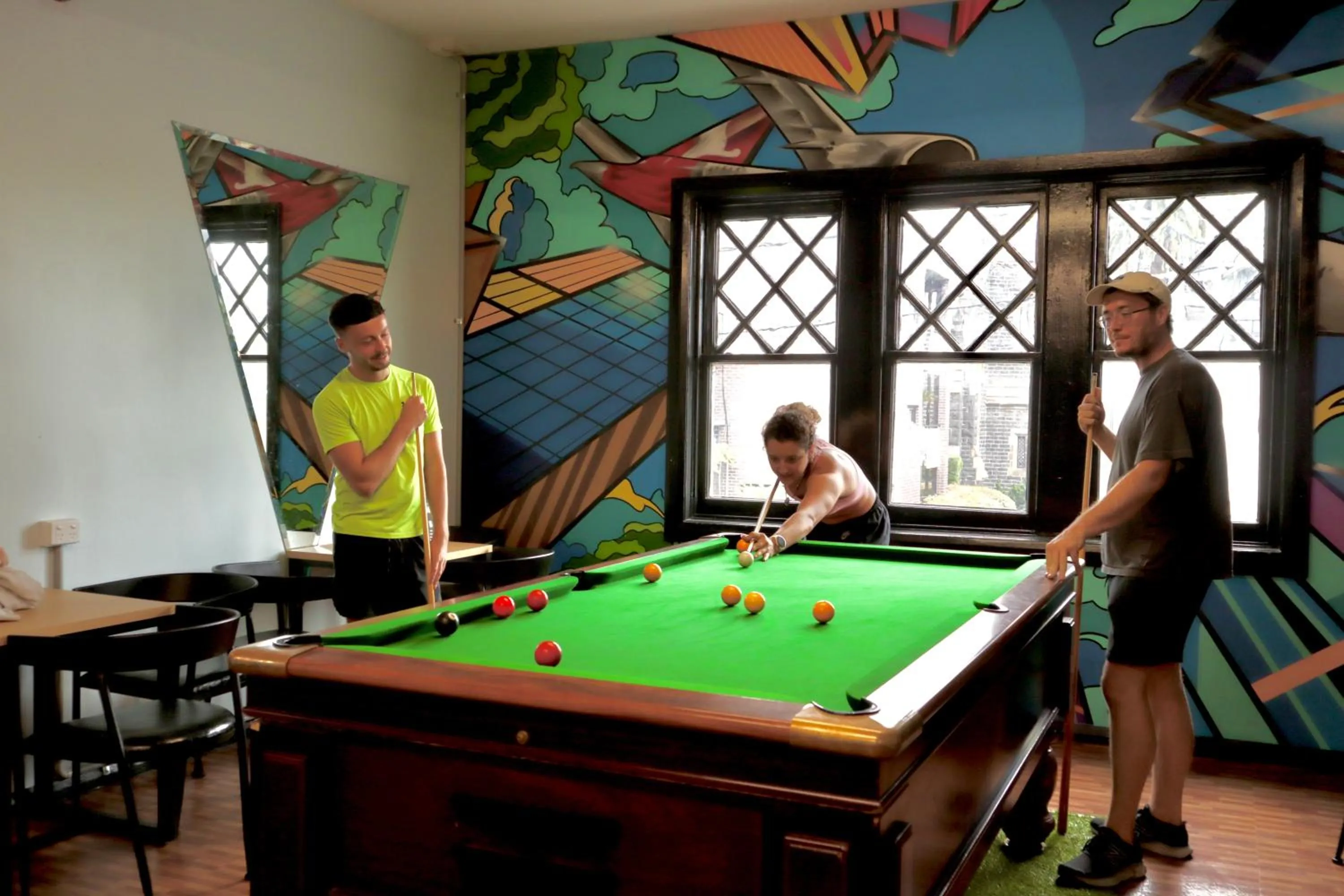 Communal lounge/ TV room in Ritz For Backpackers