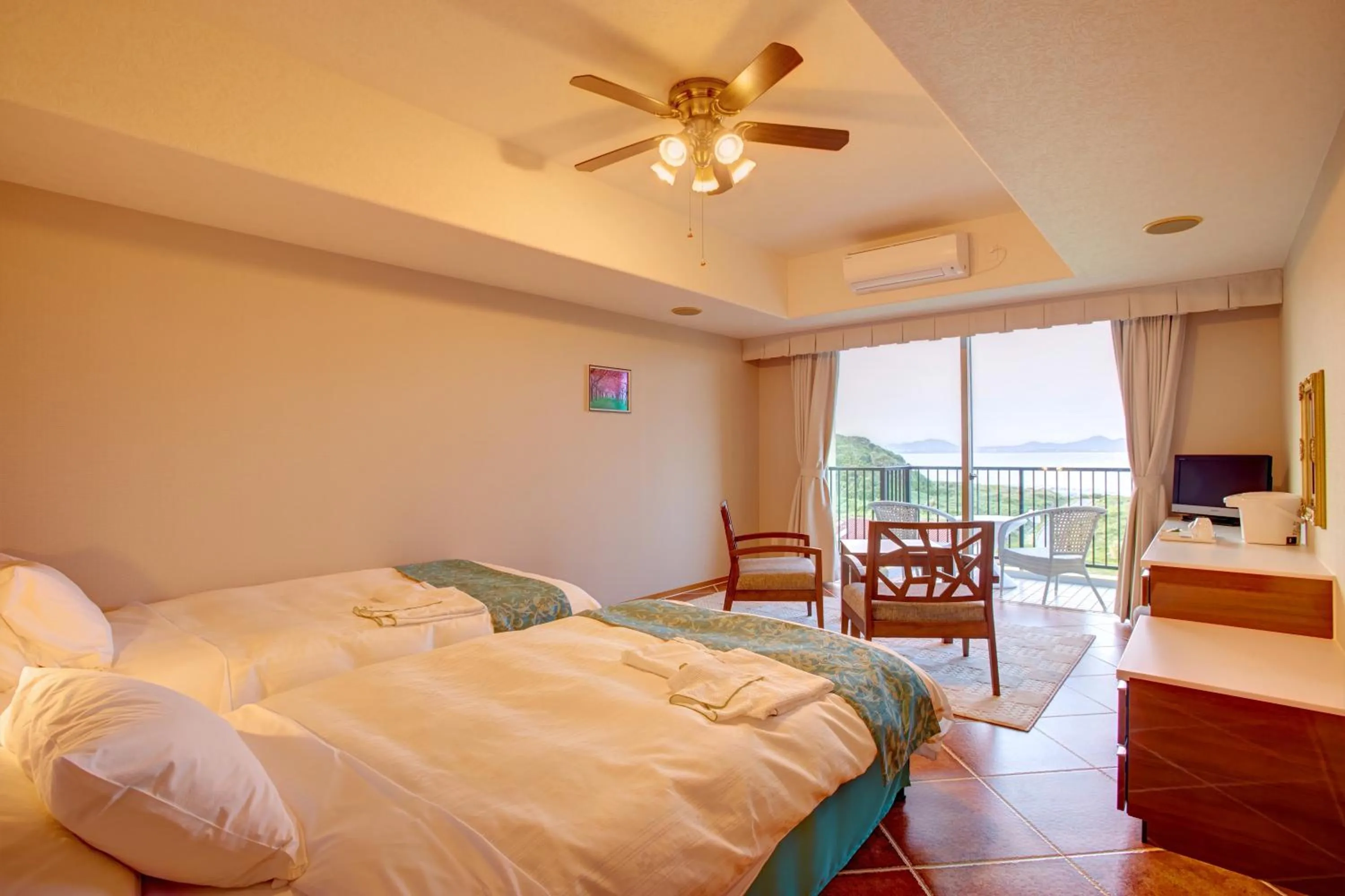 Photo of the whole room, Bed in AJ Resort Island Ikeijima