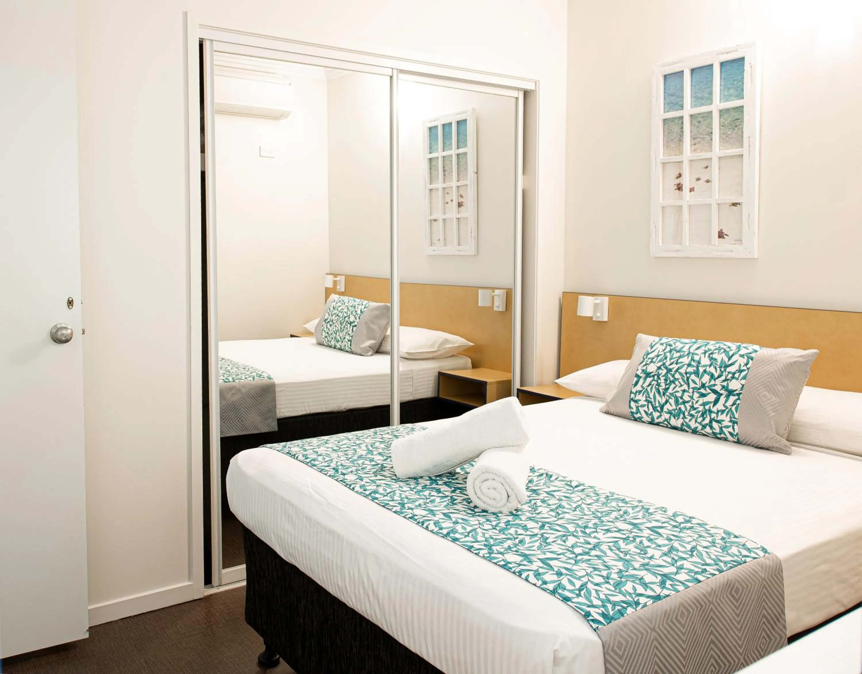 Bedroom, Bed in Coral Sea Vista Apartments